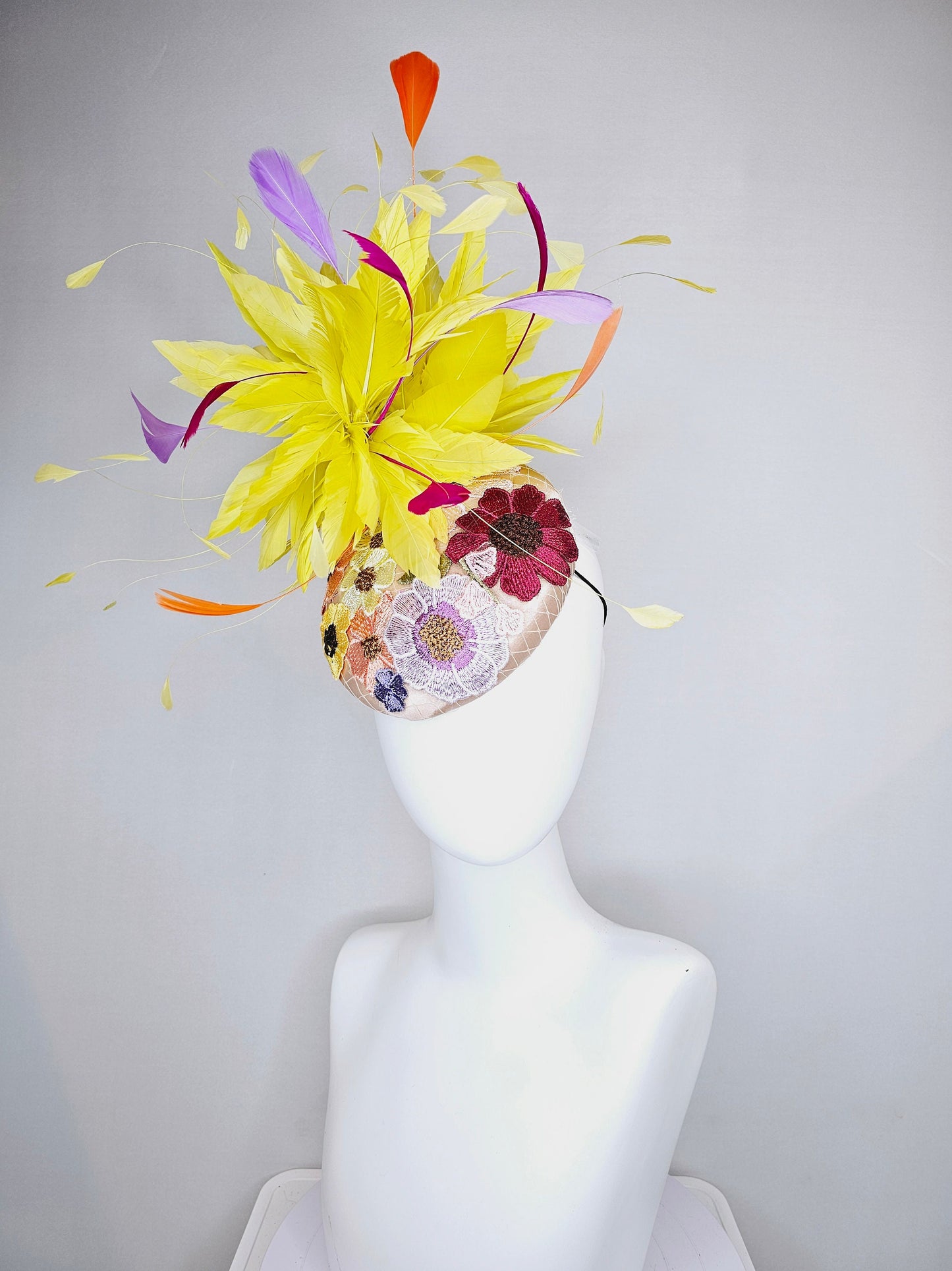 kentucky derby hat fascinator blush satin with embroidered colorful flowers with yellow feather pouf orange purple fuchsia pink feathers