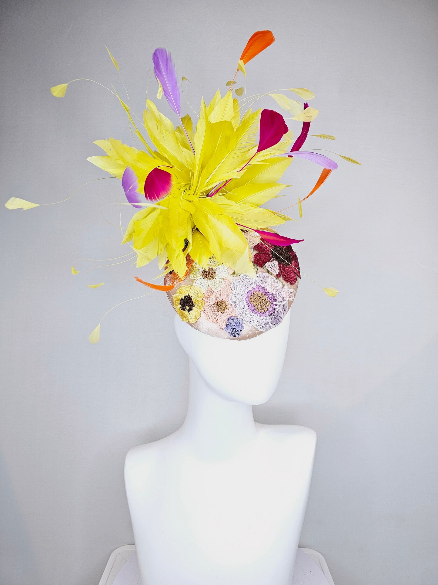 kentucky derby hat fascinator blush satin with embroidered colorful flowers with yellow feather pouf orange purple fuchsia pink feathers