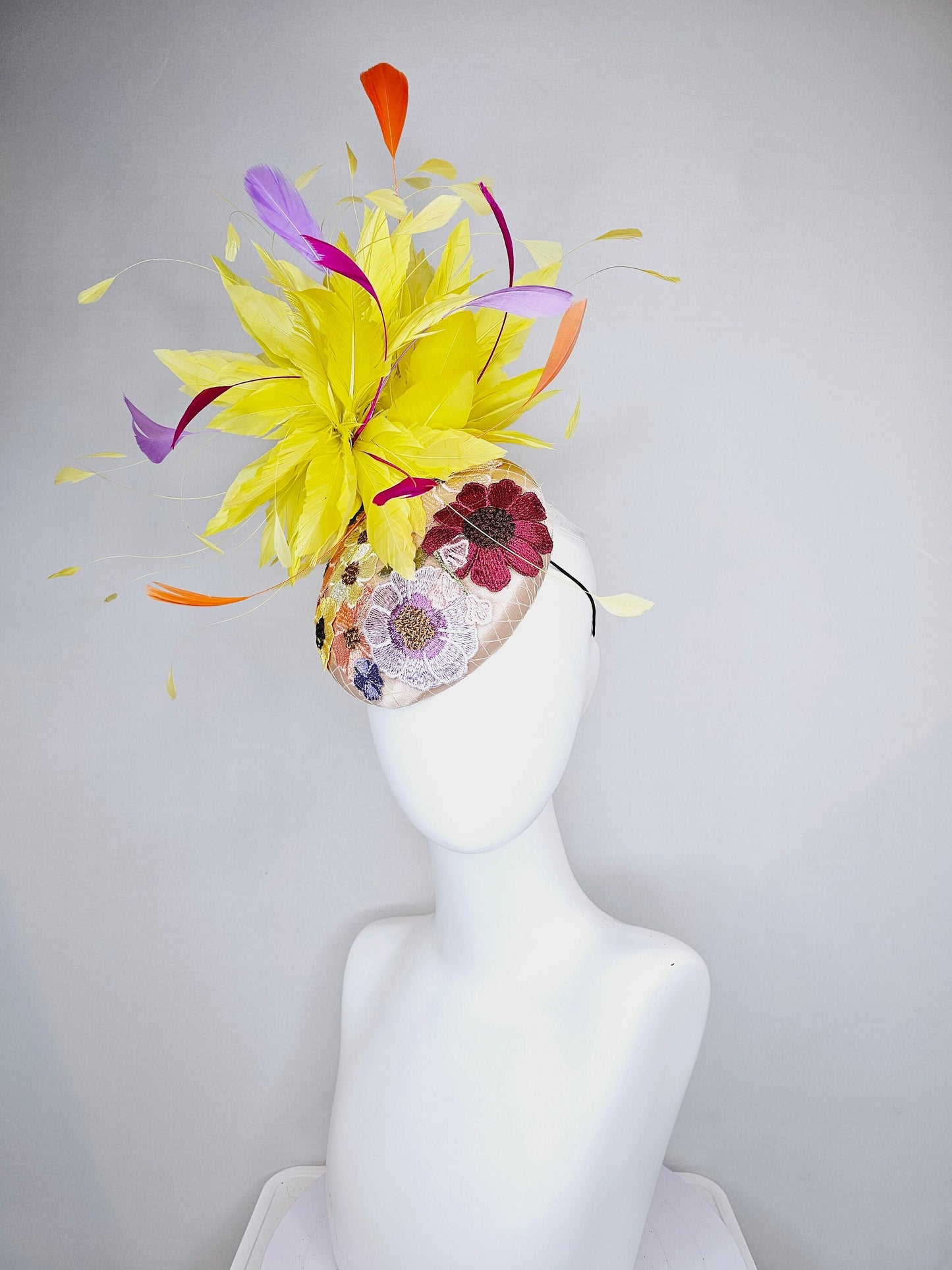 kentucky derby hat fascinator blush satin with embroidered colorful flowers with yellow feather pouf orange purple fuchsia pink feathers