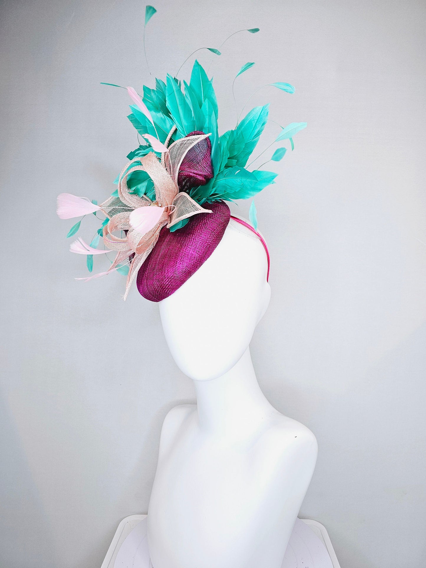 kentucky derby hat fascinator purple magenta sinmaay blush pink sinamay flower with pearls and bright green feathers