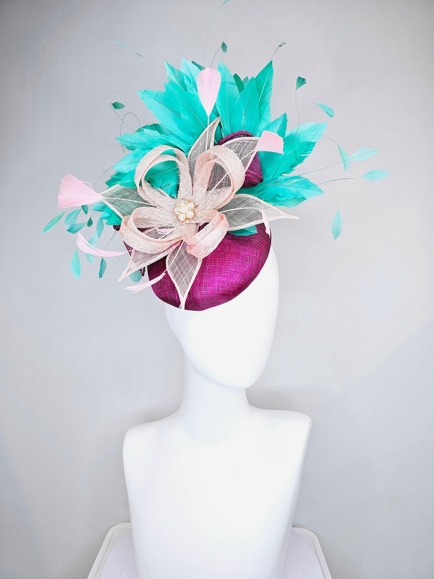 kentucky derby hat fascinator purple magenta sinmaay blush pink sinamay flower with pearls and bright green feathers