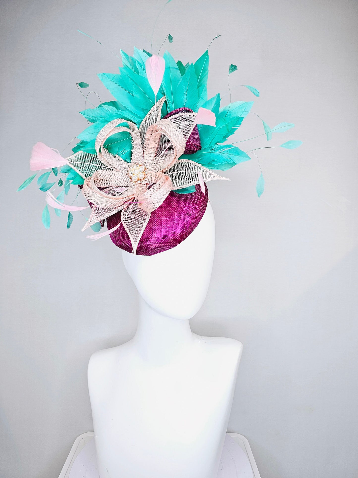 kentucky derby hat fascinator purple magenta sinmaay blush pink sinamay flower with pearls and bright green feathers