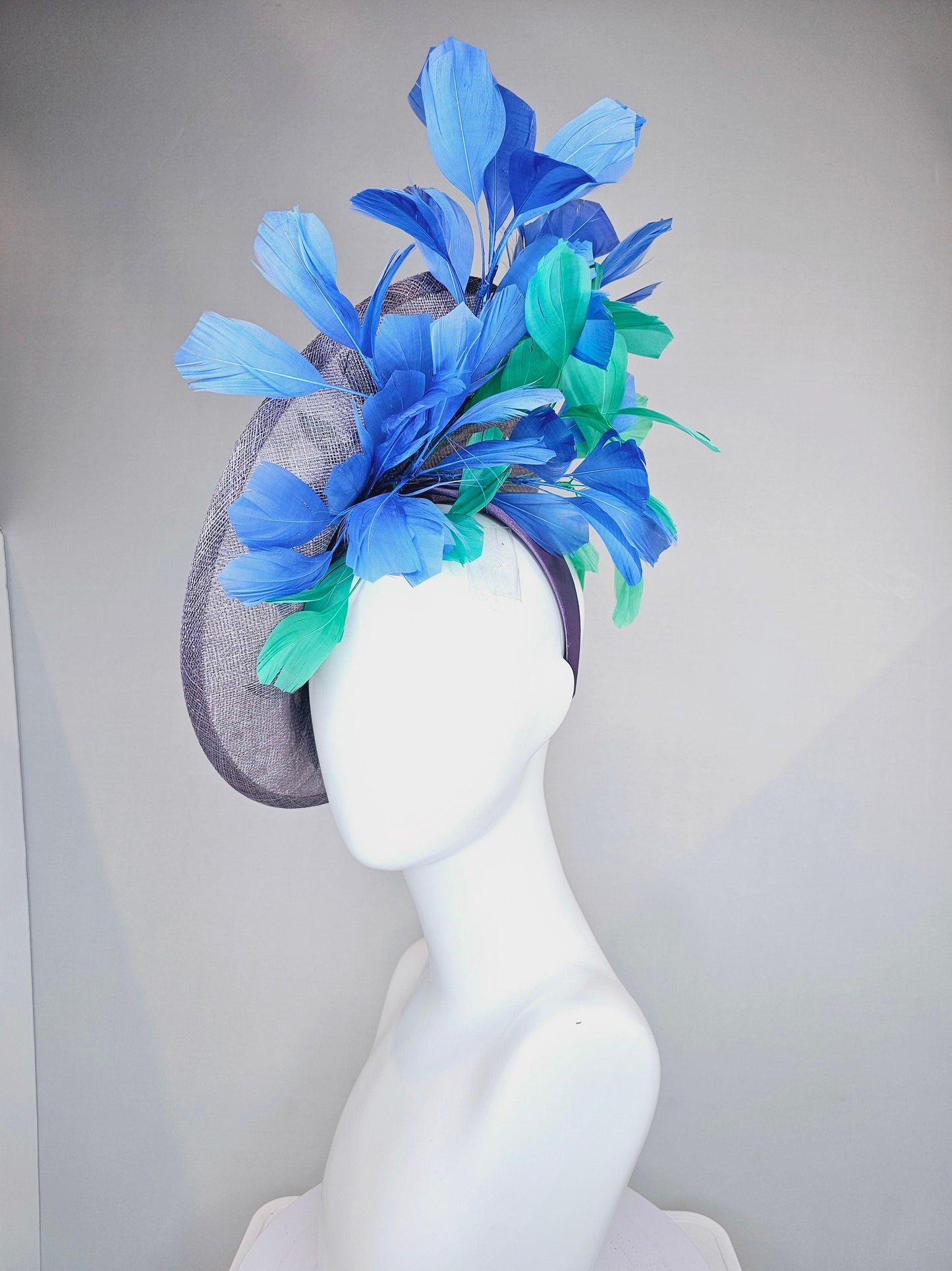 kentucky derby hat fascinator light purple lavender sinamay saucer with blue green feathers and blue green  gold embroidered flowers