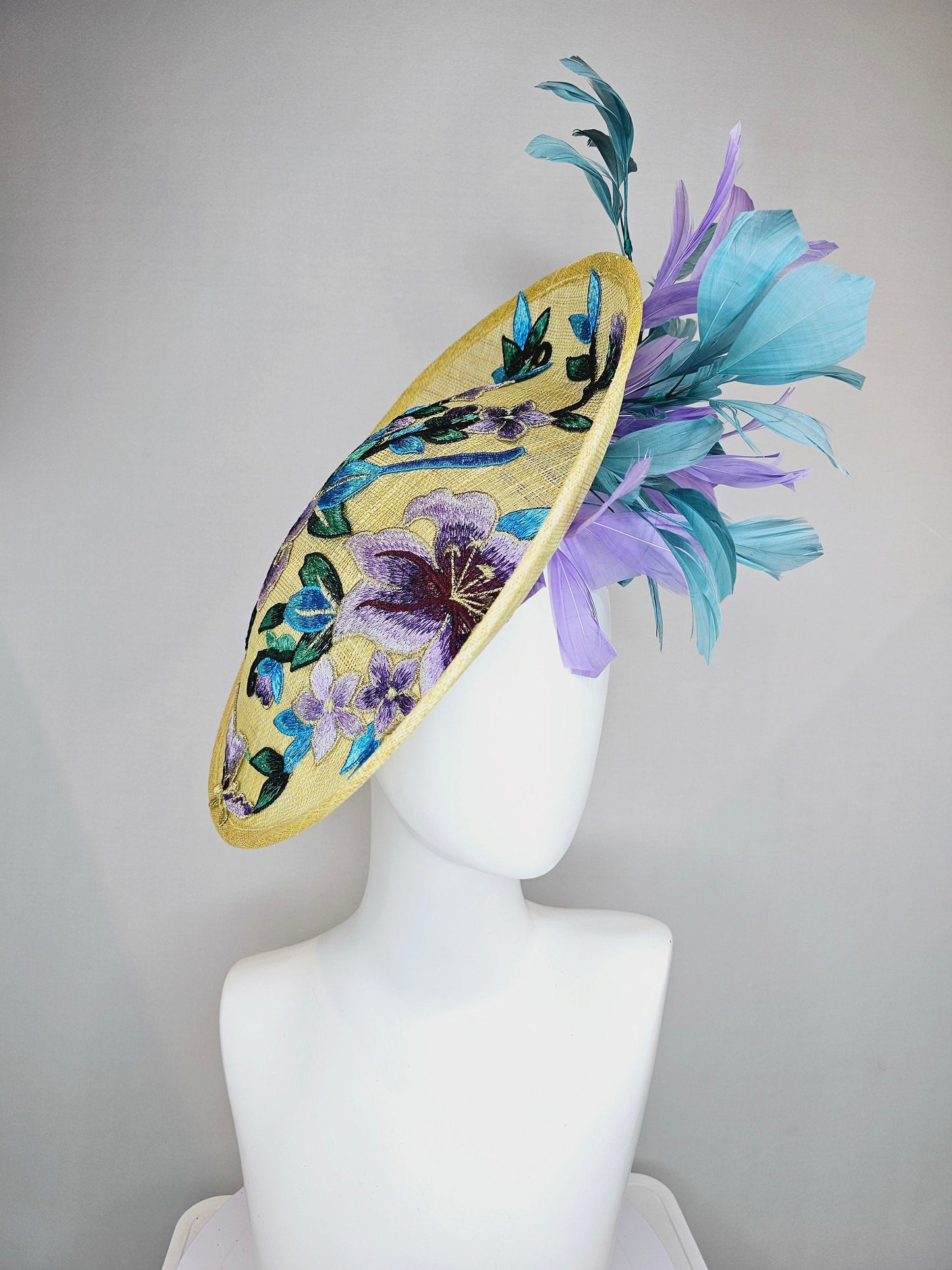 kentucky derby hat fascinator yellow sinamay saucer with blue violet purple feathers and blue lavender purple  gold embroidered flowers