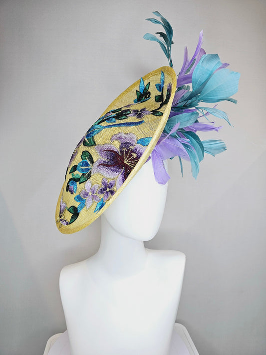 kentucky derby hat fascinator yellow sinamay saucer with blue violet purple feathers and blue lavender purple  gold embroidered flowers