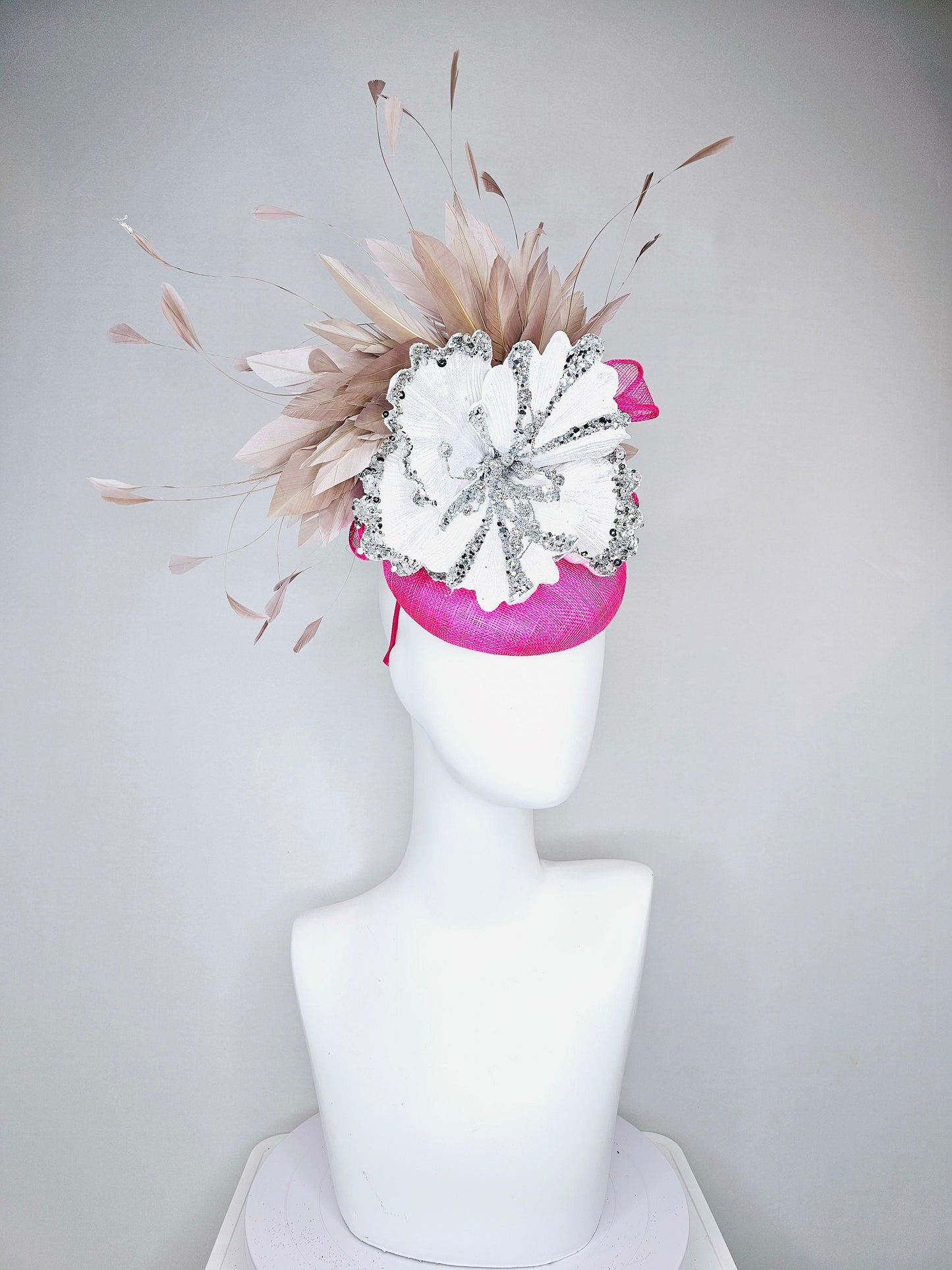 kentucky derby hat fascinator bright  hot pink fuchsia sinamay with large white silver flower with taupe heather neutral feathers