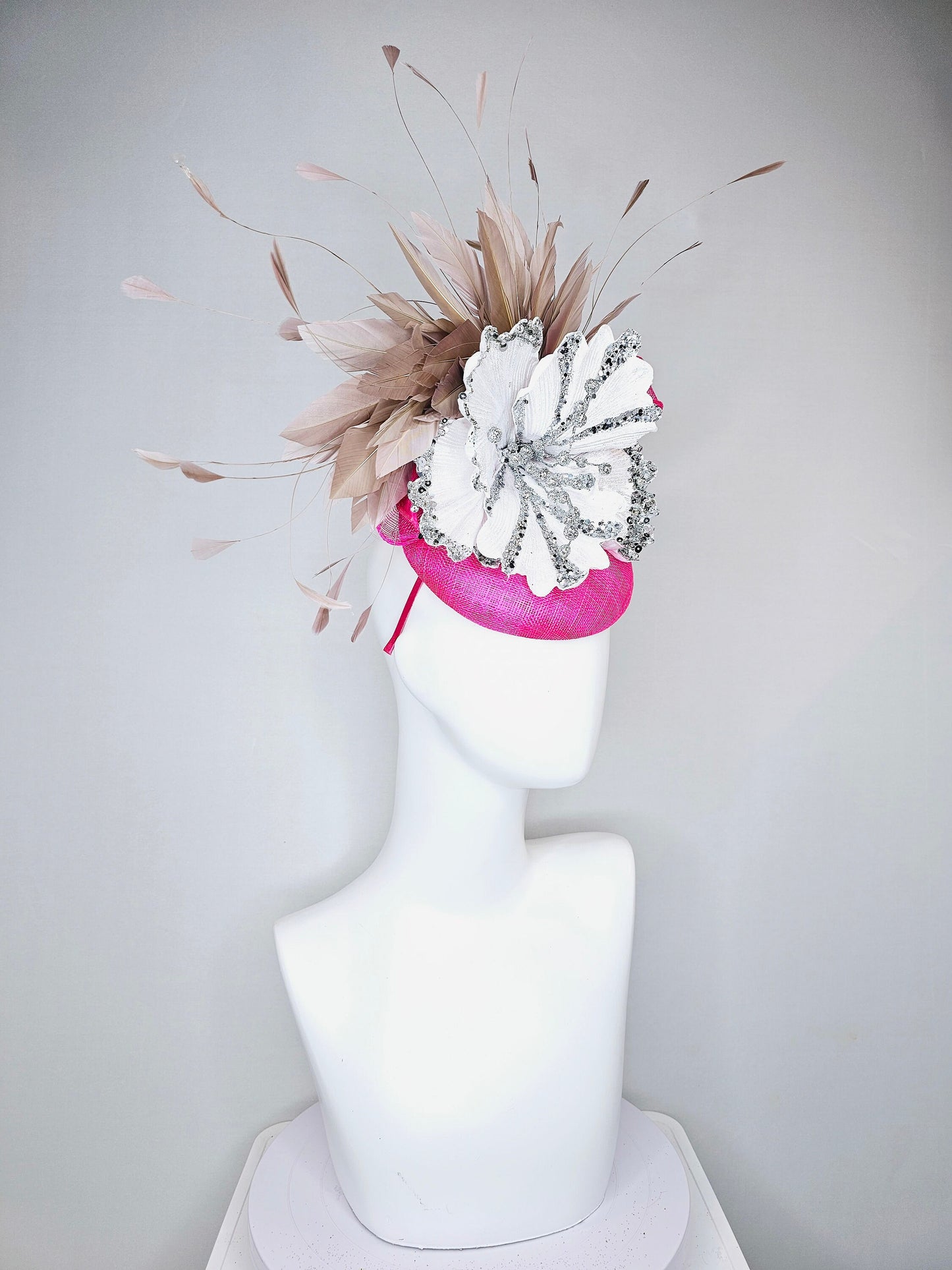 kentucky derby hat fascinator bright  hot pink fuchsia sinamay with large white silver flower with taupe heather neutral feathers