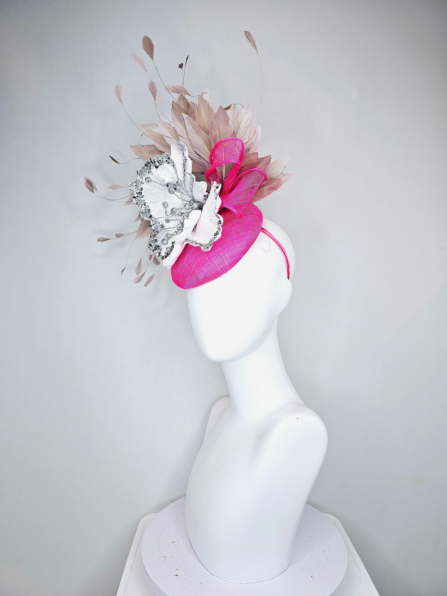 kentucky derby hat fascinator bright  hot pink fuchsia sinamay with large white silver flower with taupe heather neutral feathers