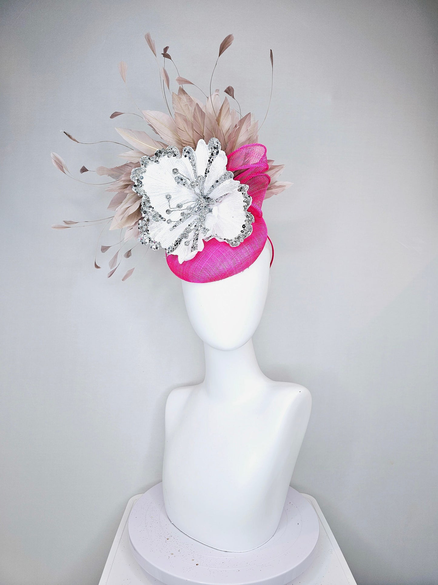 kentucky derby hat fascinator bright  hot pink fuchsia sinamay with large white silver flower with taupe heather neutral feathers