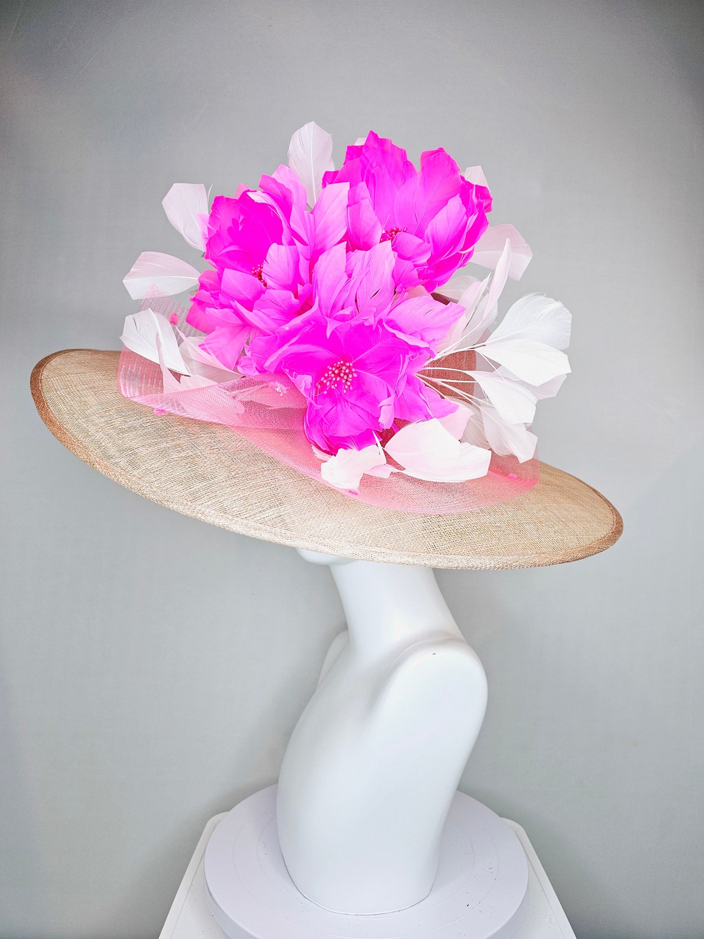 kentucky derby hat large wide brim sinamay neutral taupe beige hat with large white feathers bright pink  feather flowers