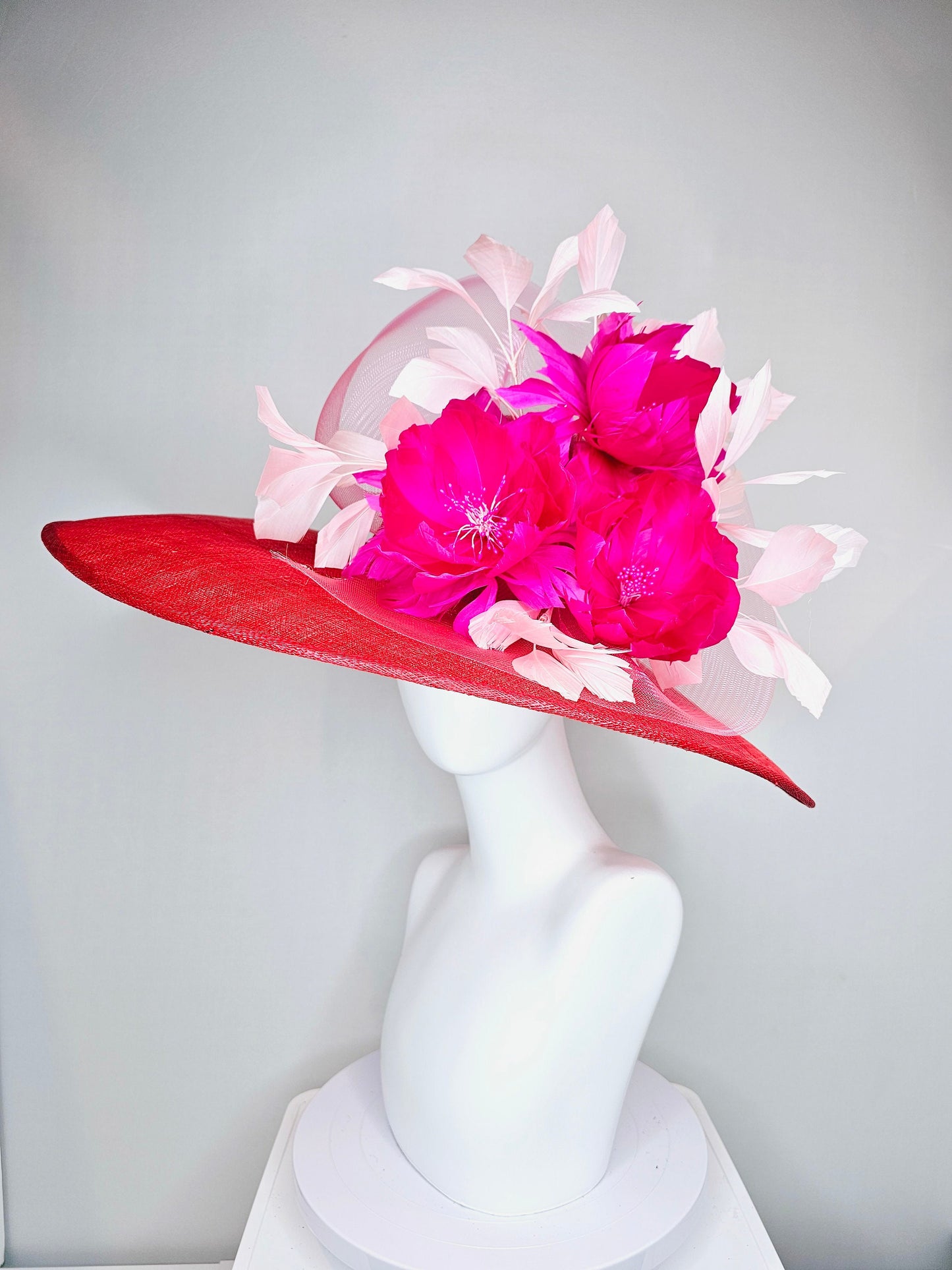 kentucky derby hat large wide brim sinamay red hat with light pink  feathers bright hot pink fuchsia  feather flowers