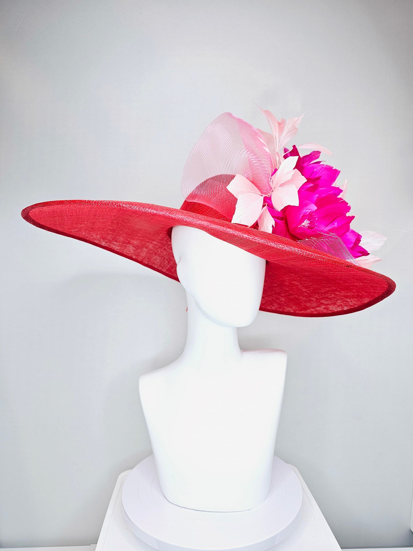 kentucky derby hat large wide brim sinamay red hat with light pink  feathers bright hot pink fuchsia  feather flowers