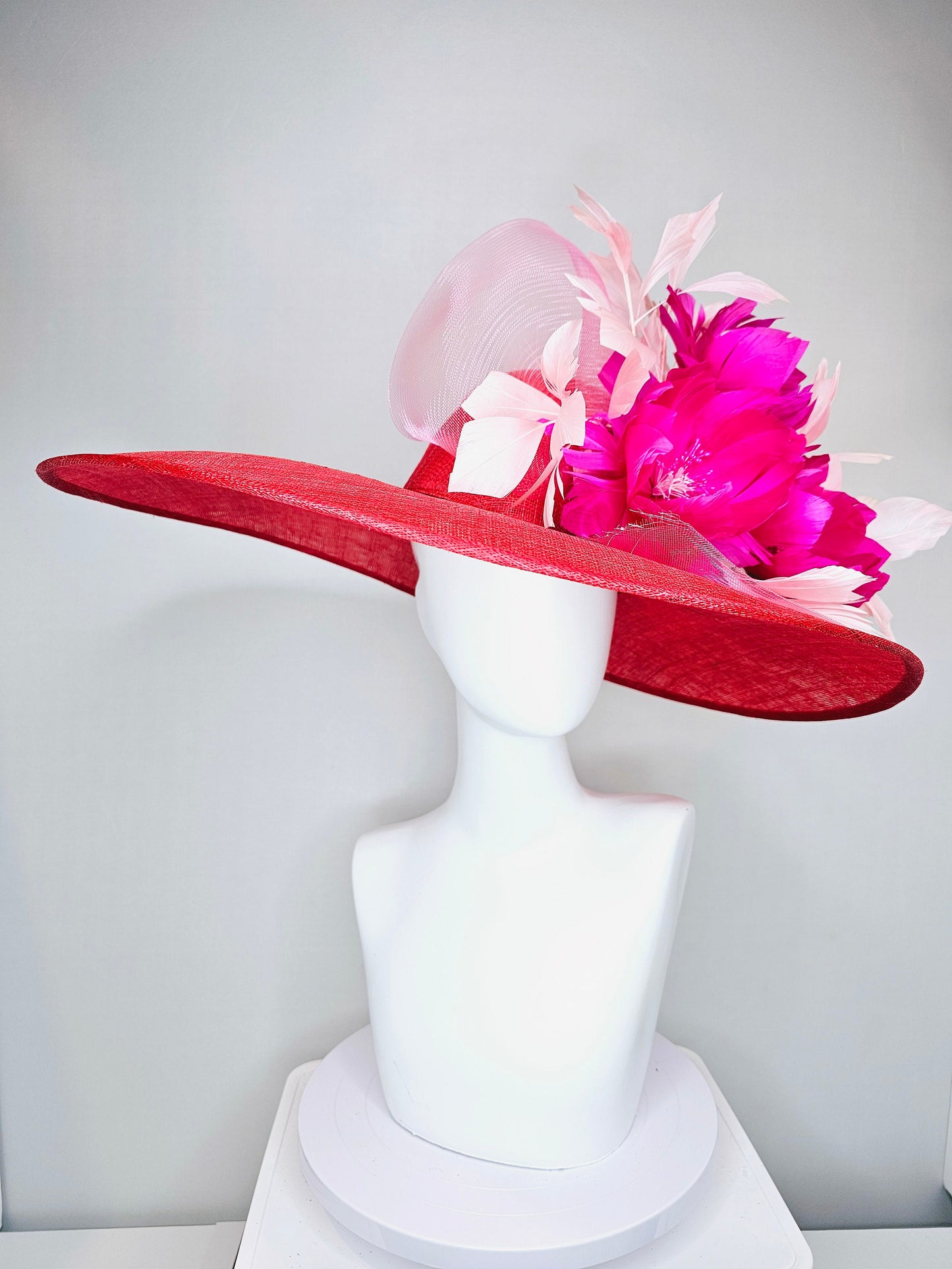 kentucky derby hat large wide brim sinamay red hat with light pink  feathers bright hot pink fuchsia  feather flowers