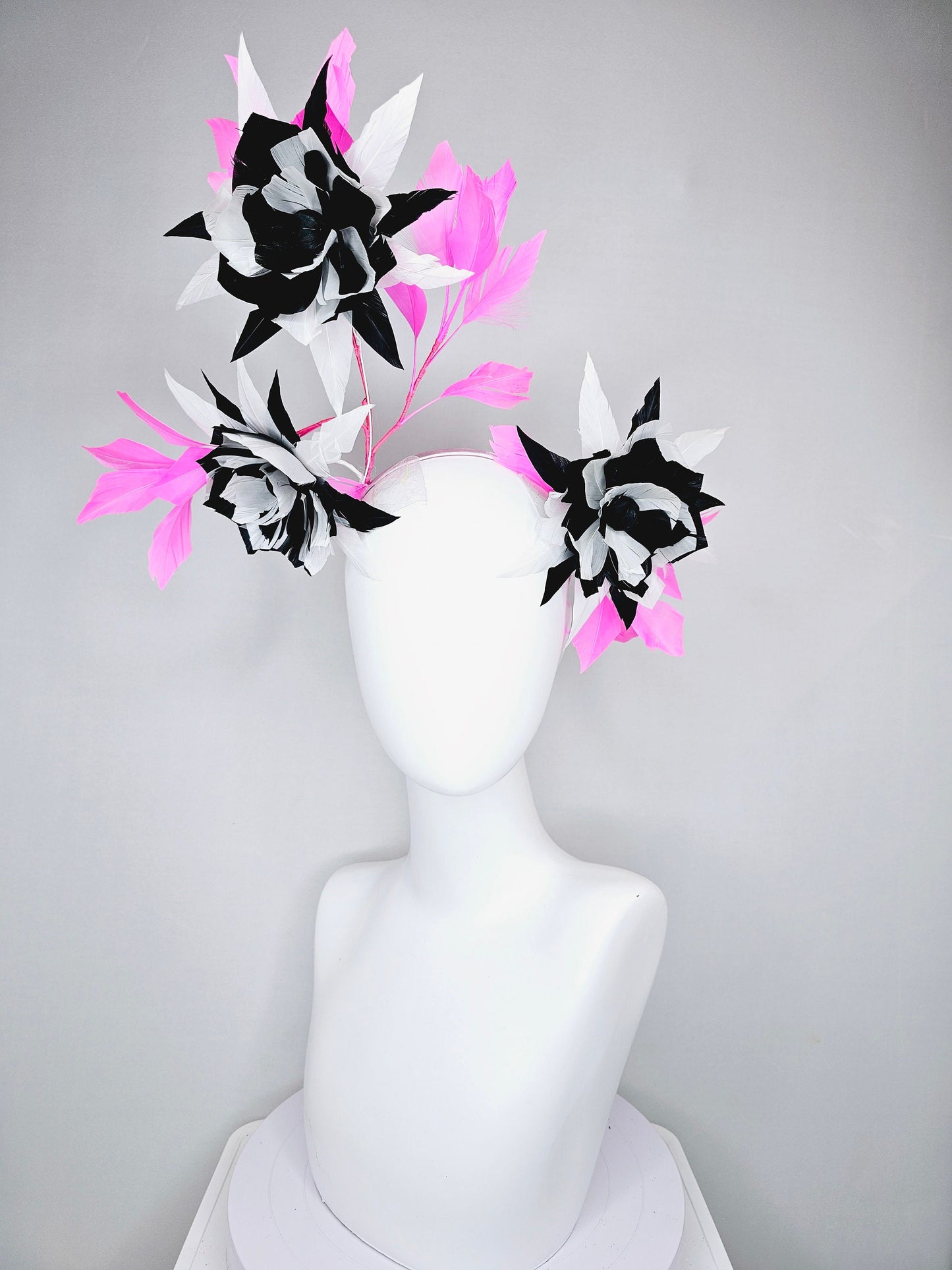 kentucky derby hat fascinator black and white abstract feather flowers with bright pink feathers