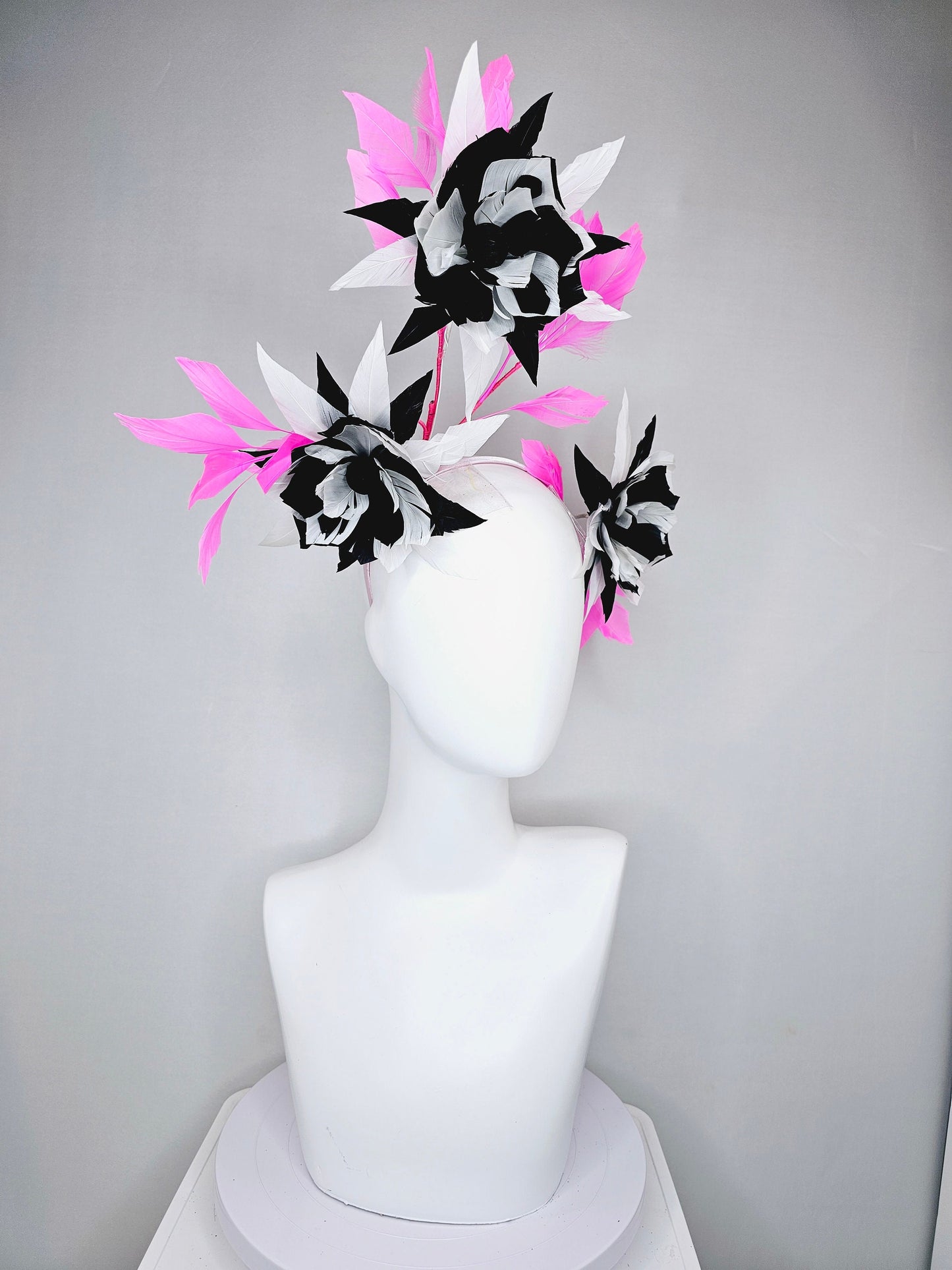 kentucky derby hat fascinator black and white abstract feather flowers with bright pink feathers