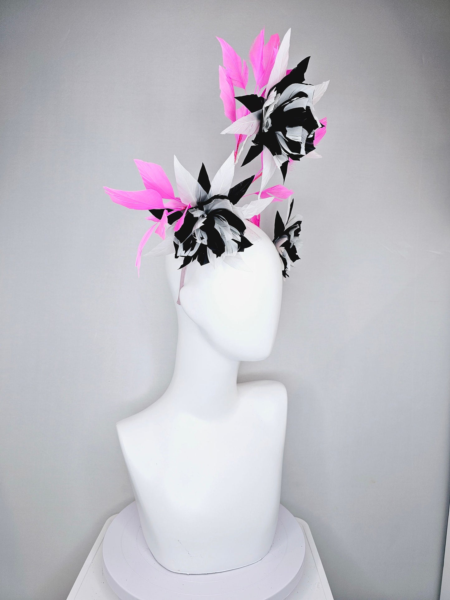 kentucky derby hat fascinator black and white abstract feather flowers with bright pink feathers