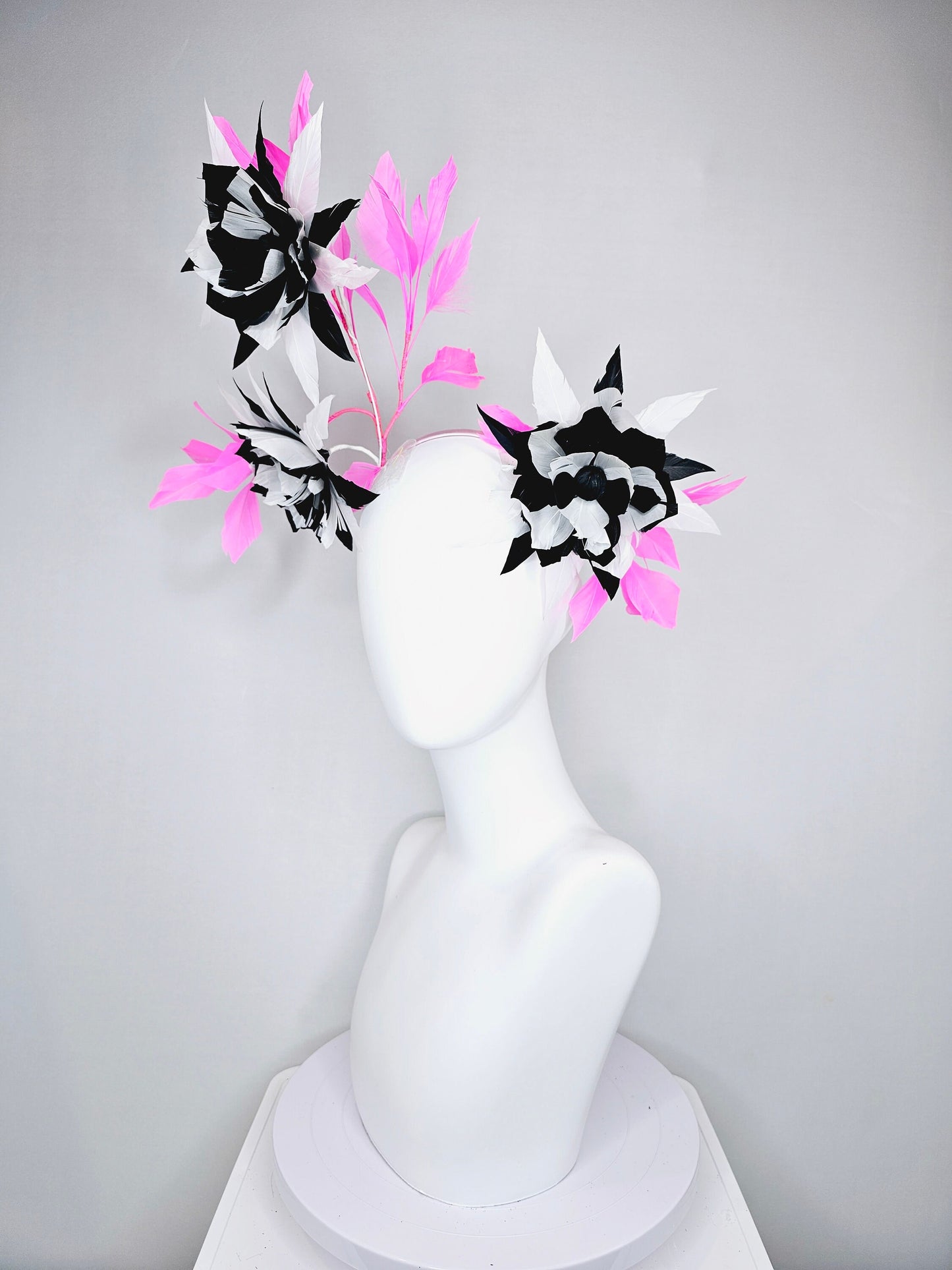 kentucky derby hat fascinator black and white abstract feather flowers with bright pink feathers