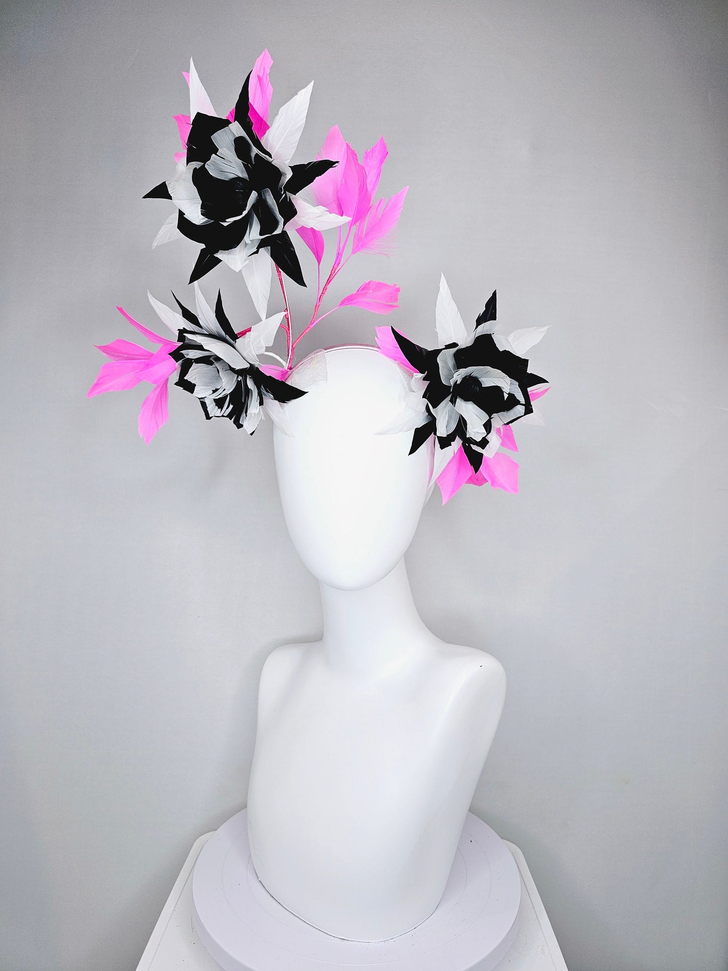 kentucky derby hat fascinator black and white abstract feather flowers with bright pink feathers