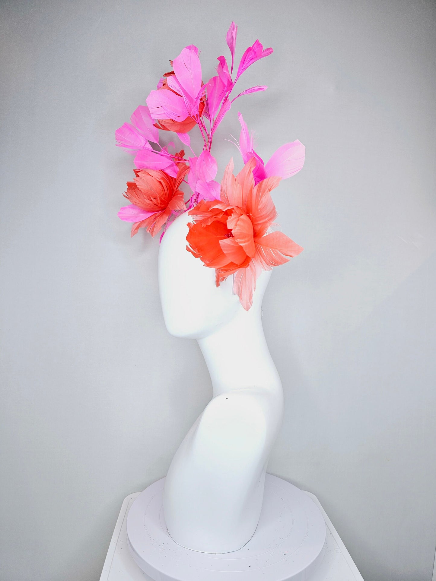 kentucky derby hat fascinator large fluffy coral orange feather flowers with pink feathers