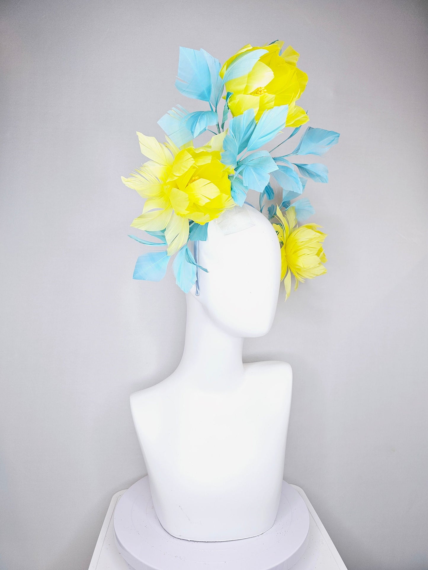 kentucky derby hat fascinator large fluffy yellow feather flowers with peacock blue teal feathers