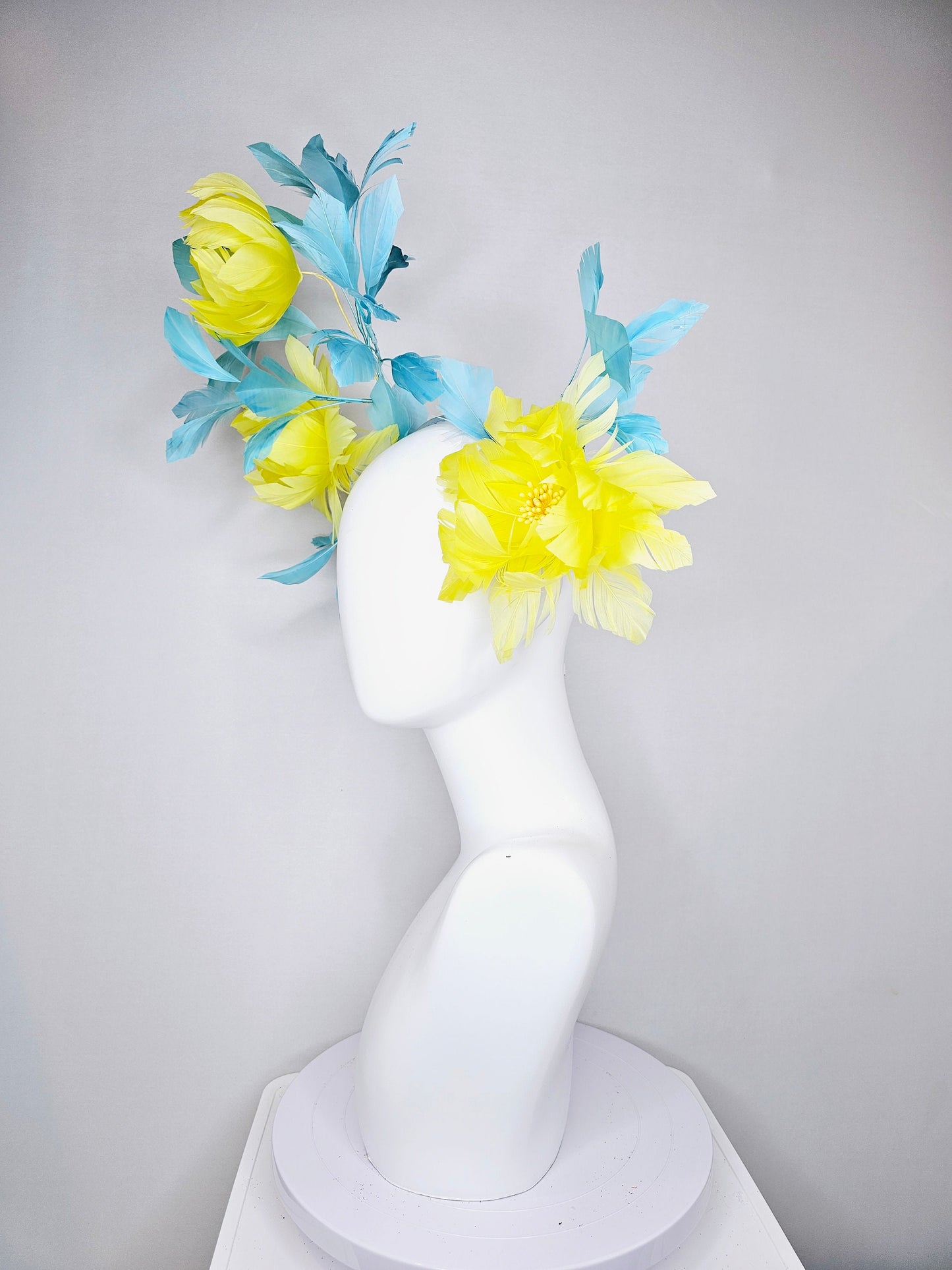 kentucky derby hat fascinator large fluffy yellow feather flowers with peacock blue teal feathers