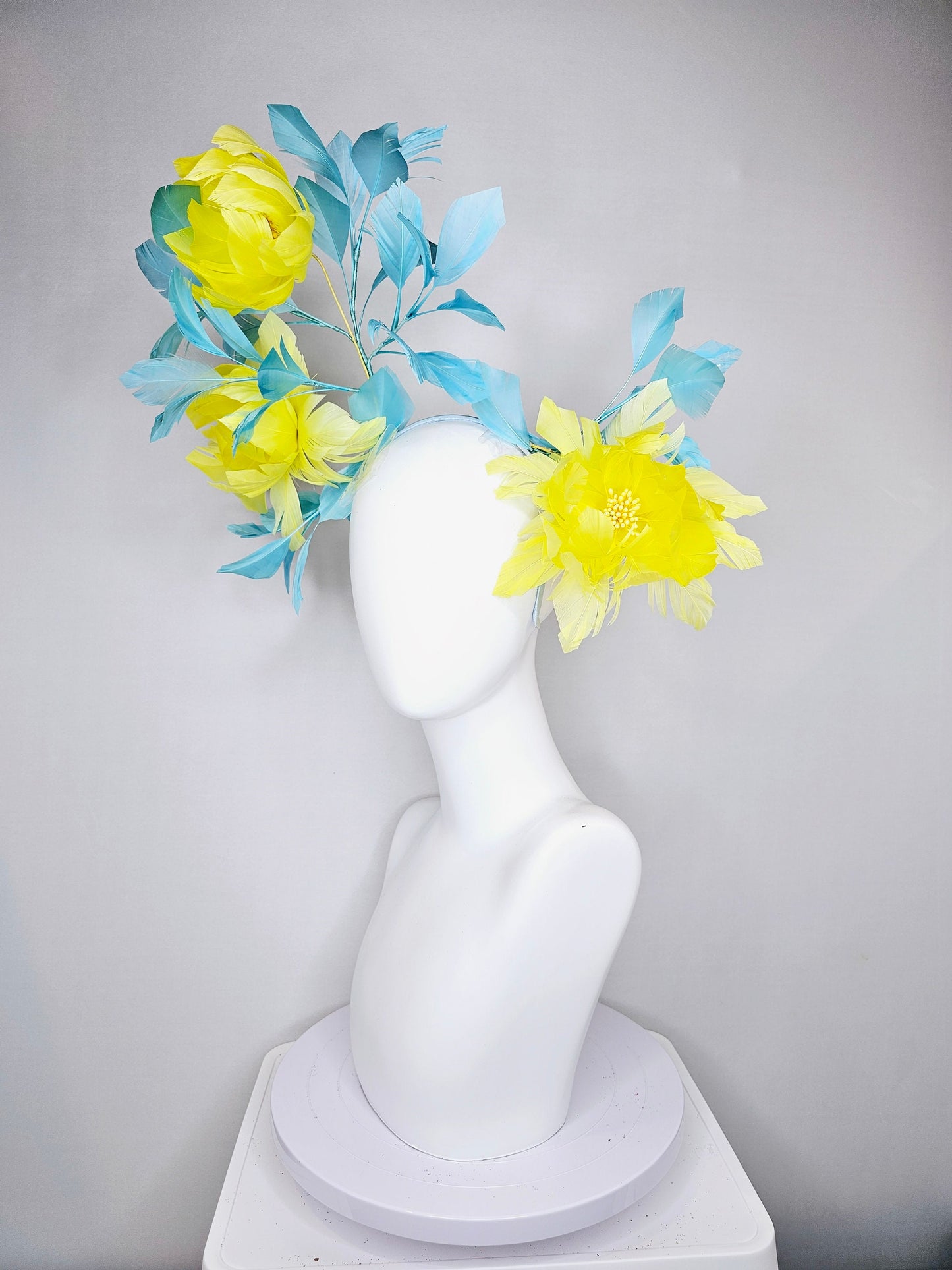 kentucky derby hat fascinator large fluffy yellow feather flowers with peacock blue teal feathers