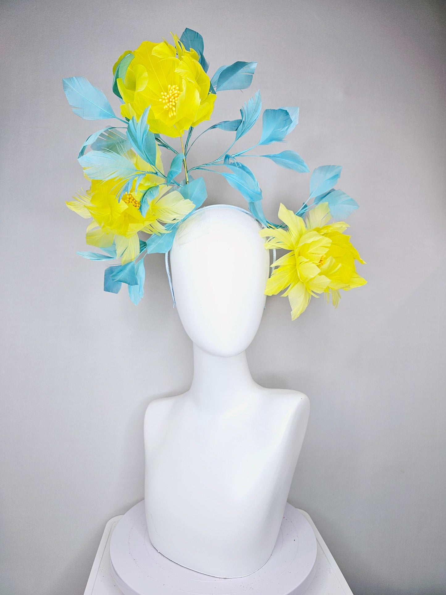 kentucky derby hat fascinator large fluffy yellow feather flowers with peacock blue teal feathers