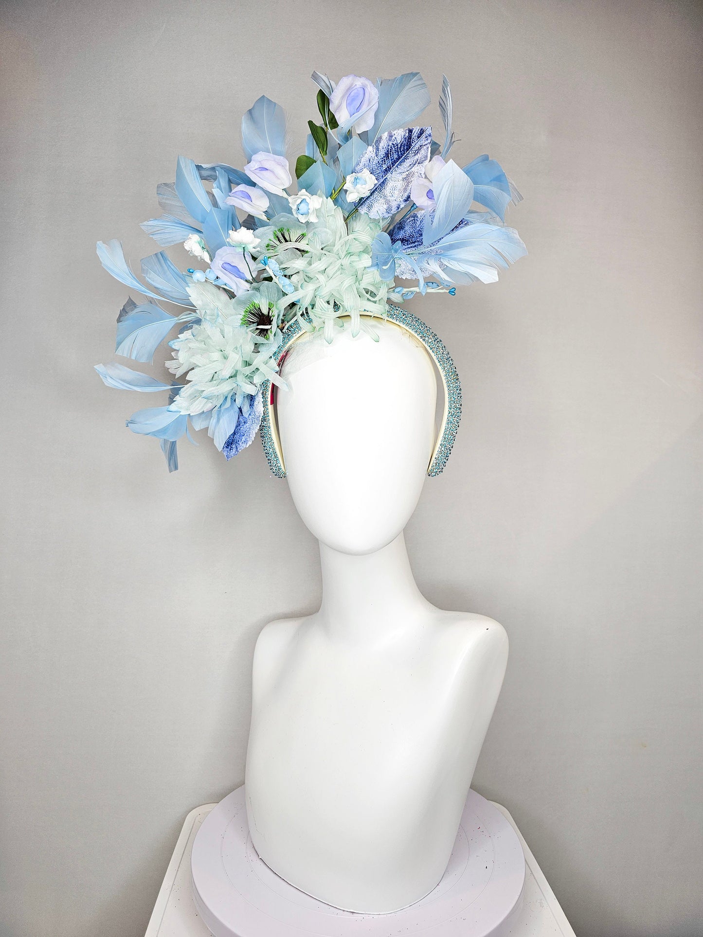 kentucky derby hat fascinator blue rhinestone crystal headband with light green mint and blue silk flowers and leaves light blue feathers