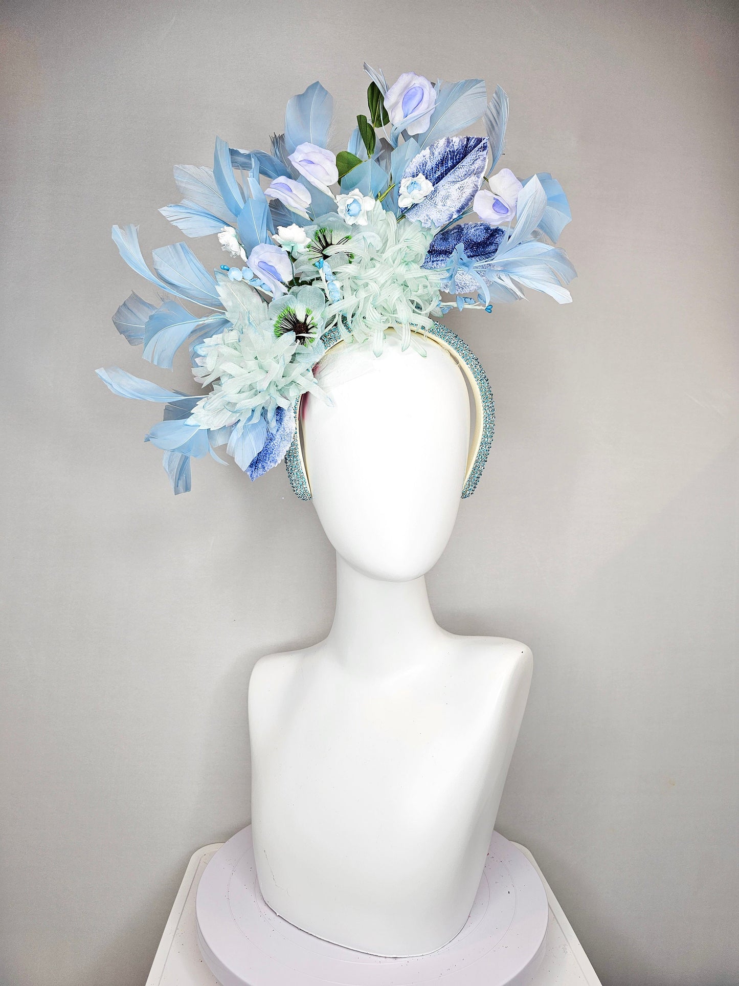 kentucky derby hat fascinator blue rhinestone crystal headband with light green mint and blue silk flowers and leaves light blue feathers