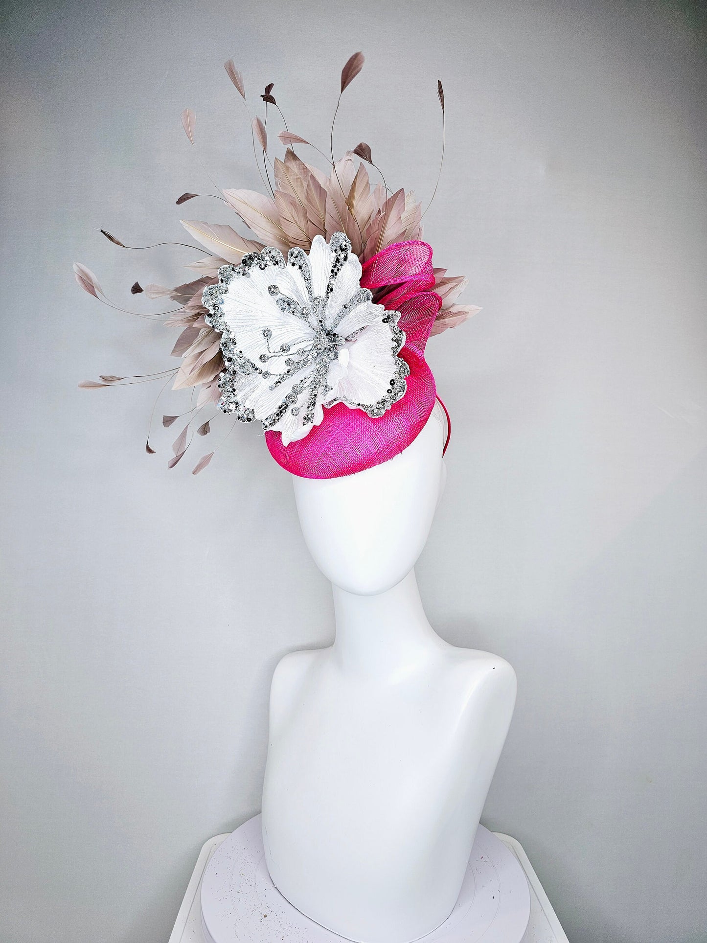 kentucky derby hat fascinator bright  hot pink fuchsia sinamay with large white silver flower with taupe heather neutral feathers