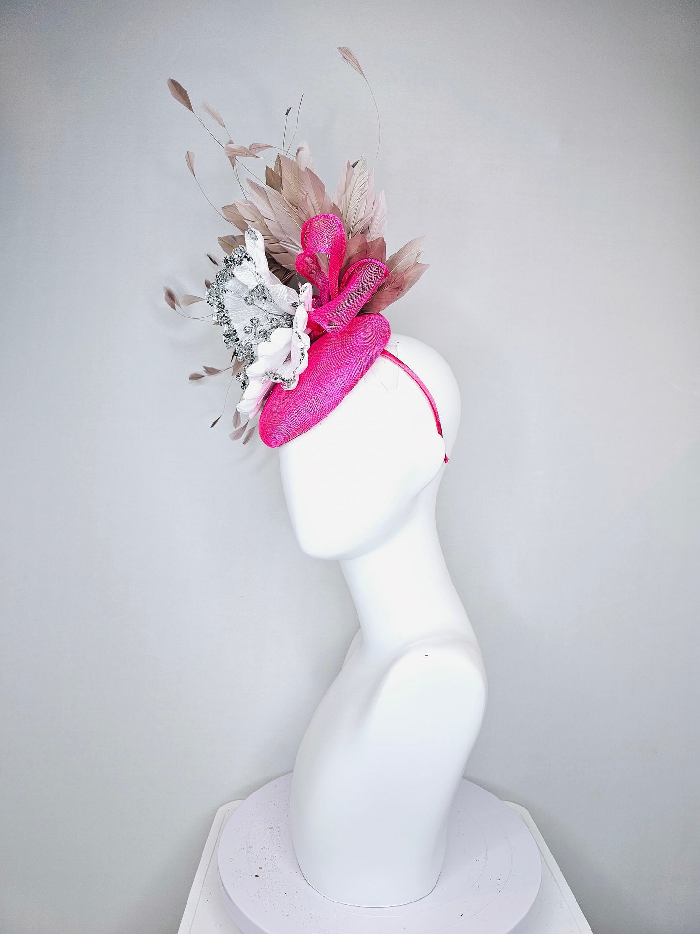 kentucky derby hat fascinator bright  hot pink fuchsia sinamay with large white silver flower with taupe heather neutral feathers