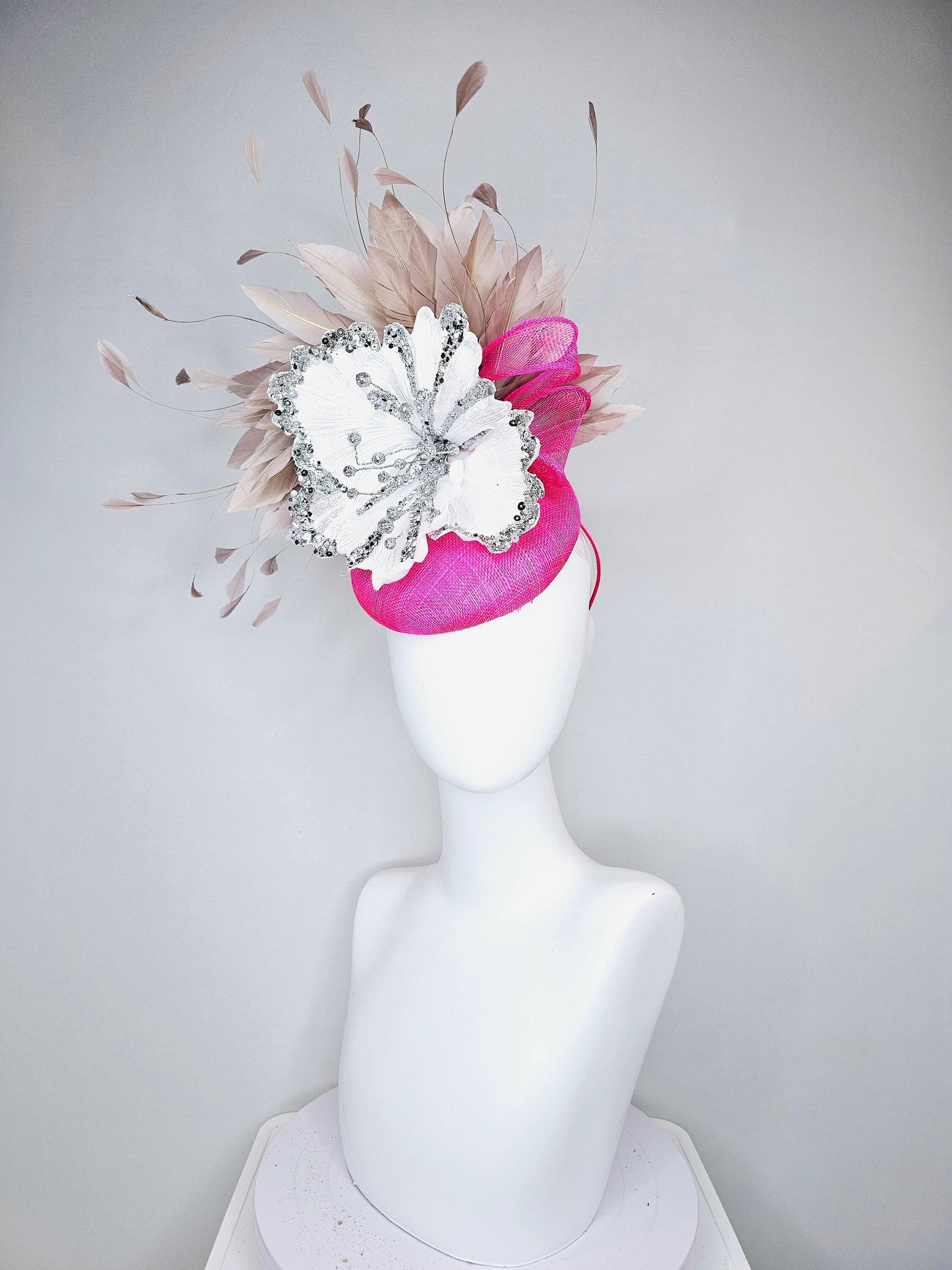 kentucky derby hat fascinator bright  hot pink fuchsia sinamay with large white silver flower with taupe heather neutral feathers