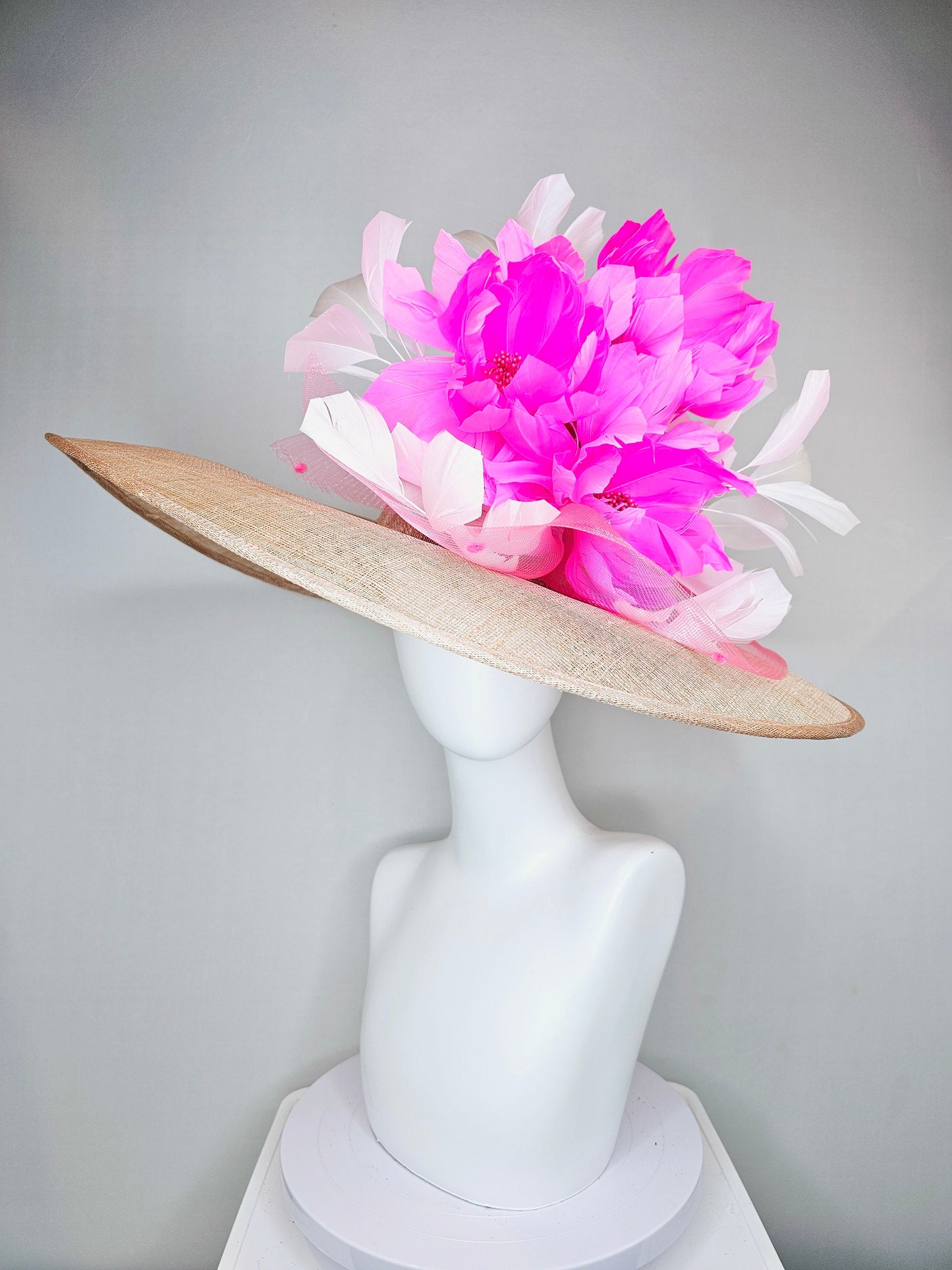 kentucky derby hat large wide brim sinamay neutral taupe beige hat with large white feathers bright pink  feather flowers