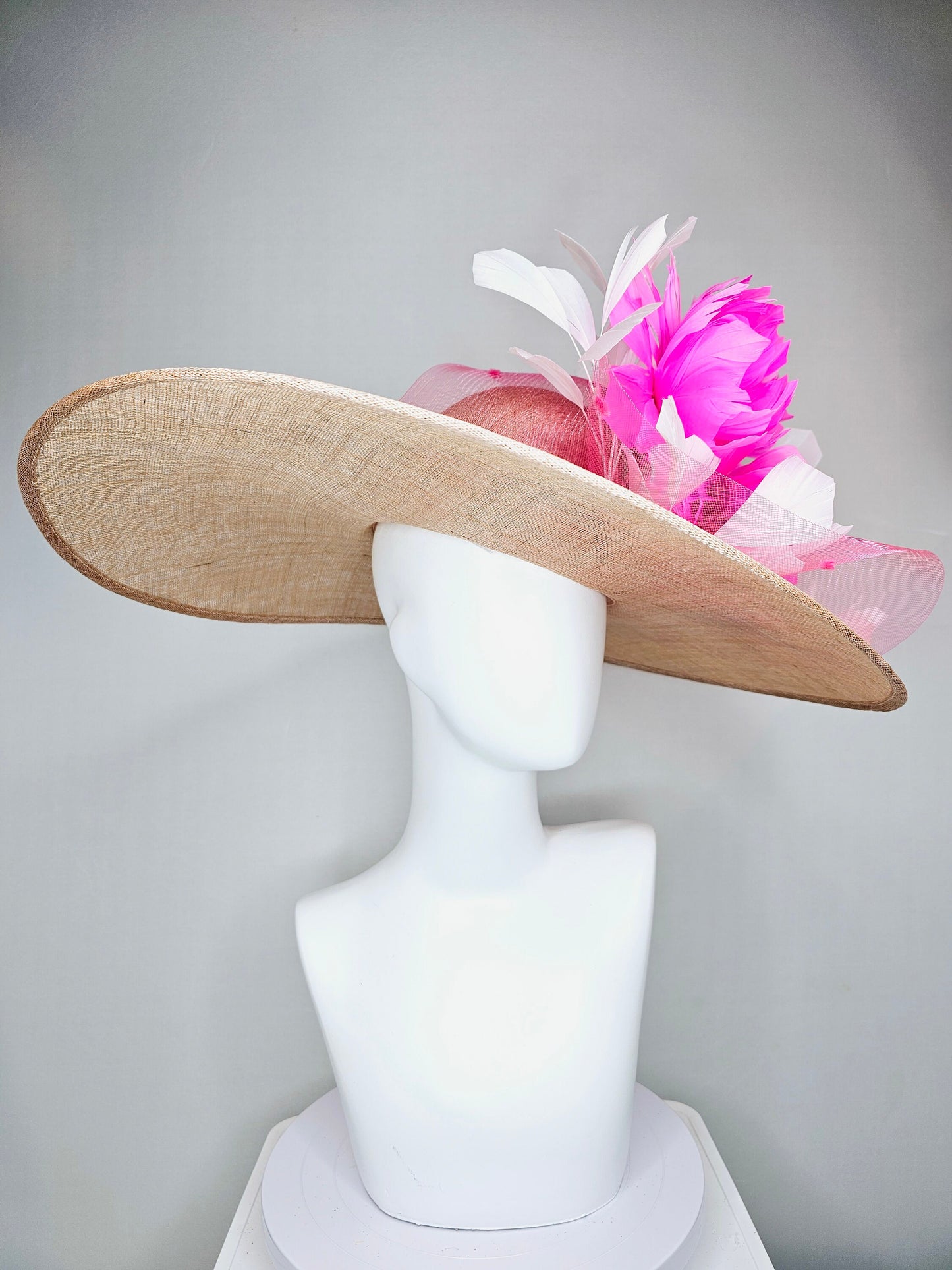 kentucky derby hat large wide brim sinamay neutral taupe beige hat with large white feathers bright pink  feather flowers