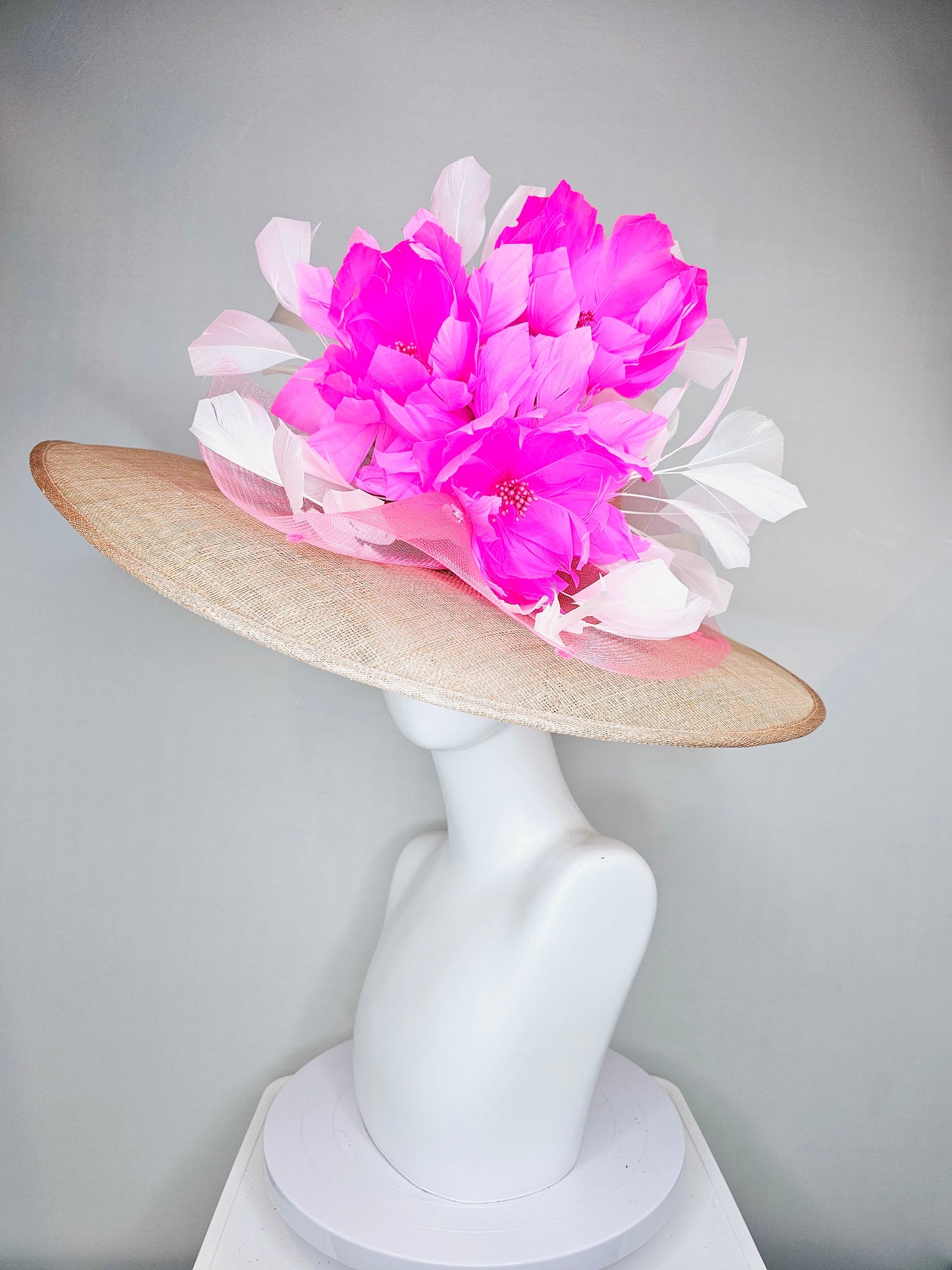 kentucky derby hat large wide brim sinamay neutral taupe beige hat with large white feathers bright pink  feather flowers