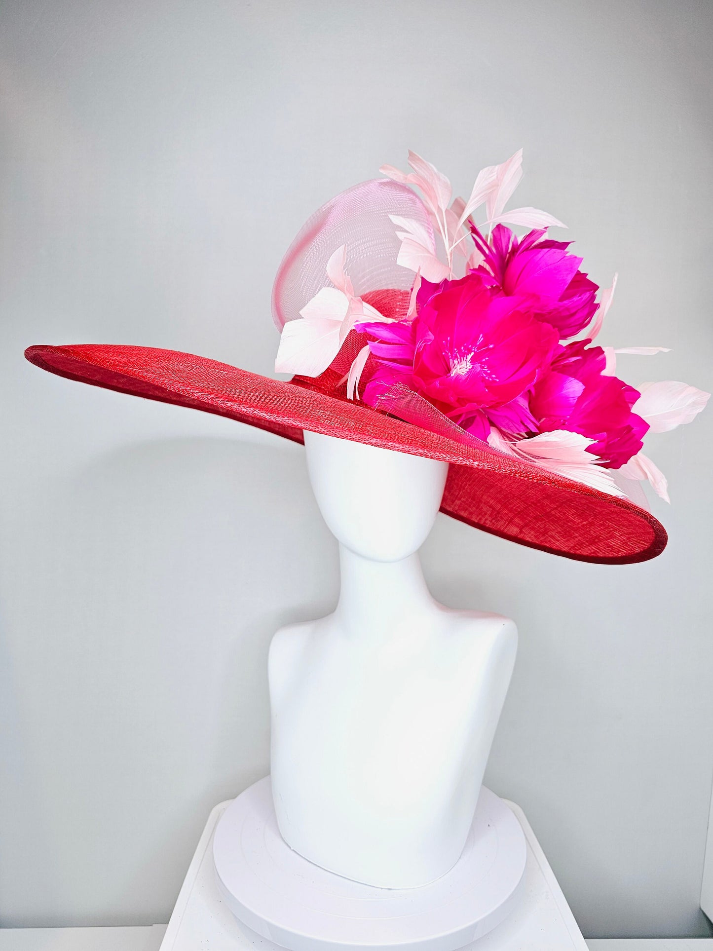 kentucky derby hat large wide brim sinamay red hat with light pink  feathers bright hot pink fuchsia  feather flowers