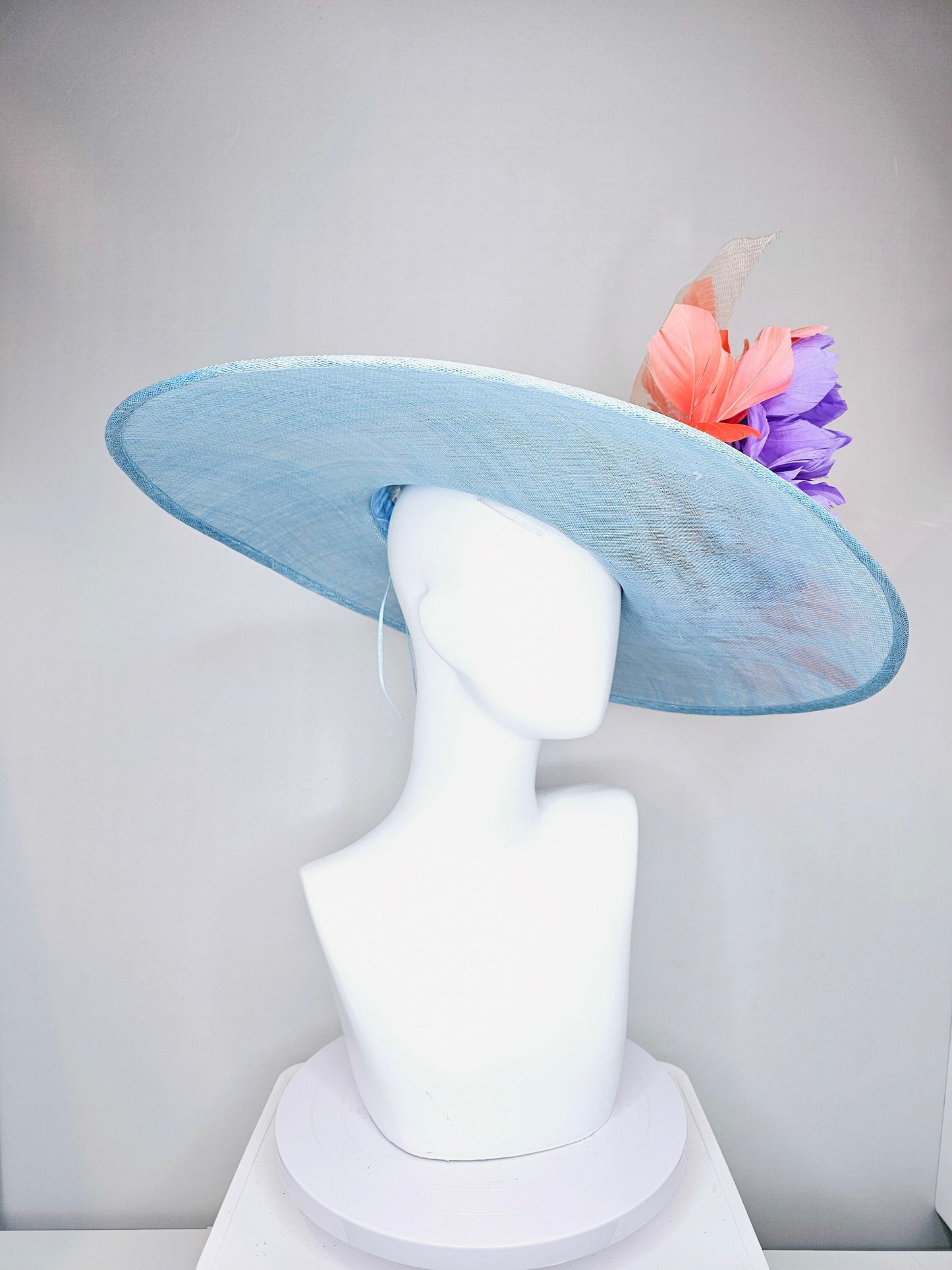 kentucky derby hat large wide brim sinamay light blue hat with coral orange  feathers purple violet feather flowers