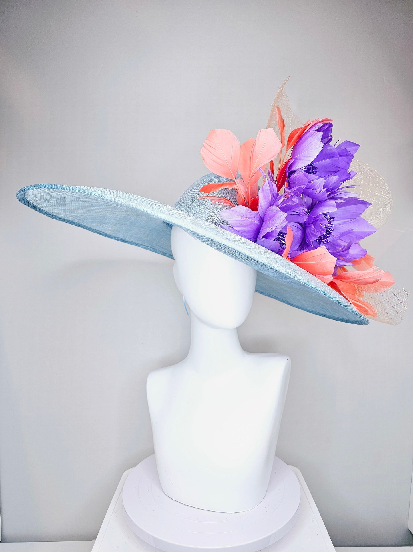 kentucky derby hat large wide brim sinamay light blue hat with coral orange  feathers purple violet feather flowers