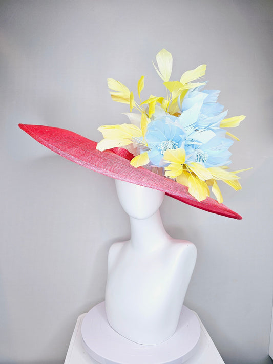 kentucky derby hat large wide brim sinamay coral pink hat with yellow feathers light blue fluffy feather flowers