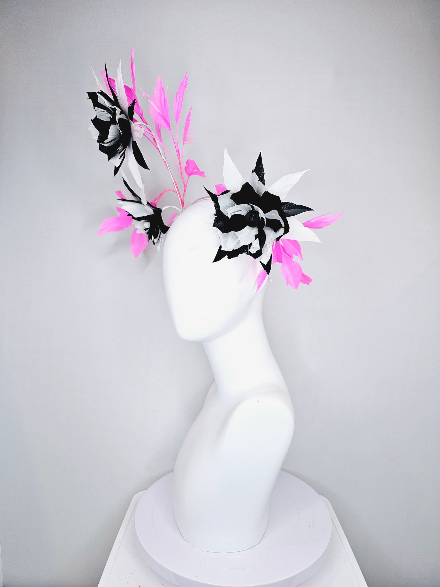 kentucky derby hat fascinator black and white abstract feather flowers with bright pink feathers