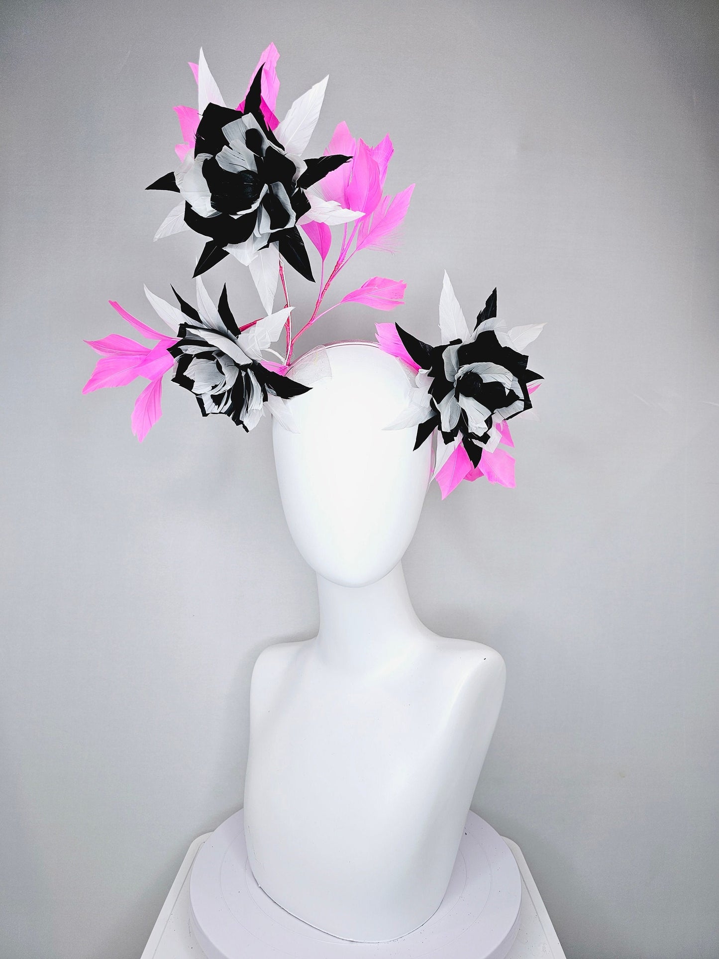 kentucky derby hat fascinator black and white abstract feather flowers with bright pink feathers