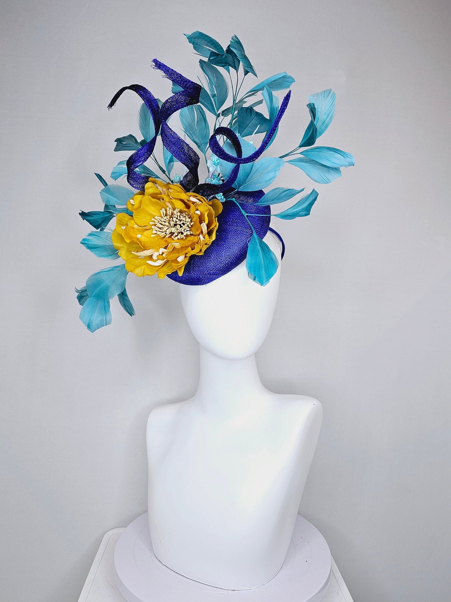 kentucky derby hat fascinator royal blue sinamay with curls mustard yellow large flower with teal peacock blue  feathers