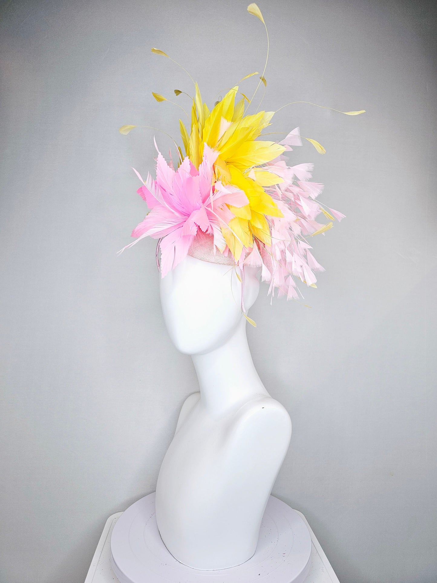 kentucky derby hat fascinator blush pink sinamay with pink feather flower and feathers with yellow feathers