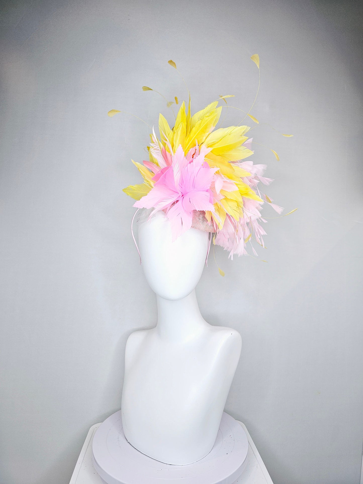 kentucky derby hat fascinator blush pink sinamay with pink feather flower and feathers with yellow feathers