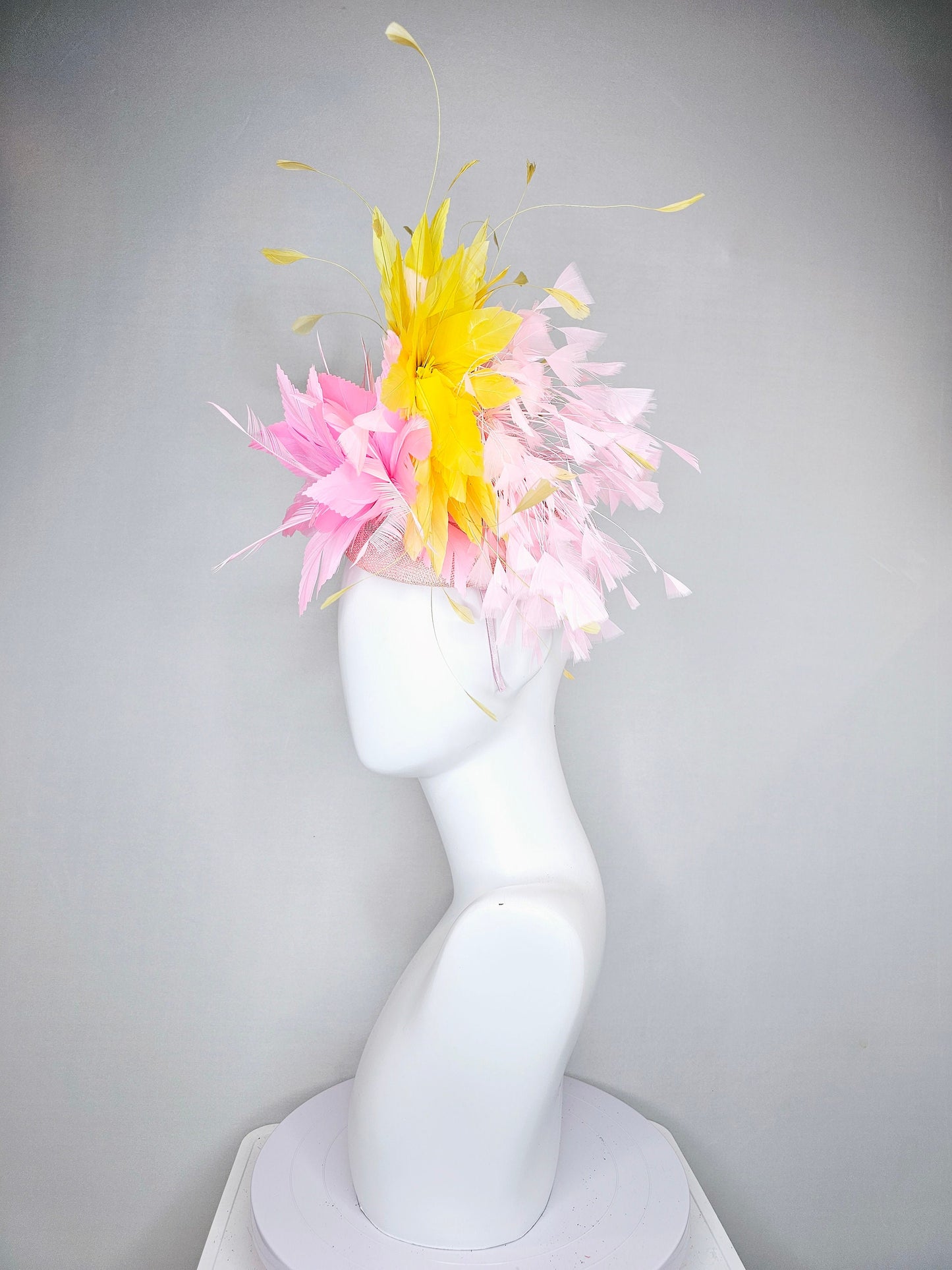 kentucky derby hat fascinator blush pink sinamay with pink feather flower and feathers with yellow feathers