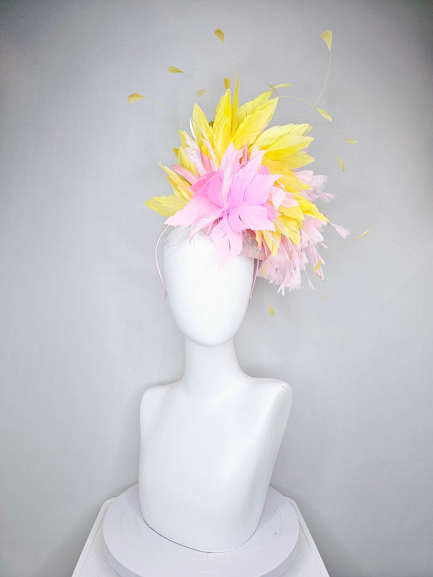 kentucky derby hat fascinator blush pink sinamay with pink feather flower and feathers with yellow feathers