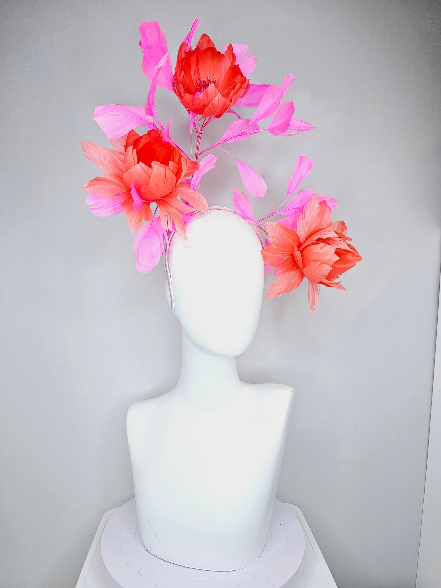 kentucky derby hat fascinator large fluffy coral orange feather flowers with pink feathers