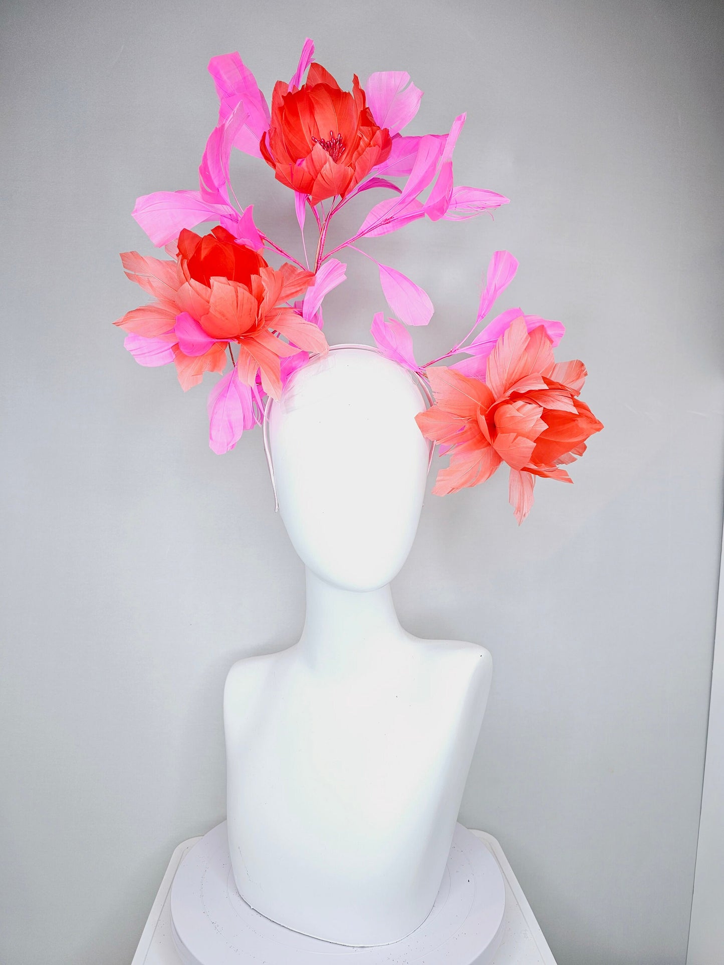 kentucky derby hat fascinator large fluffy coral orange feather flowers with pink feathers