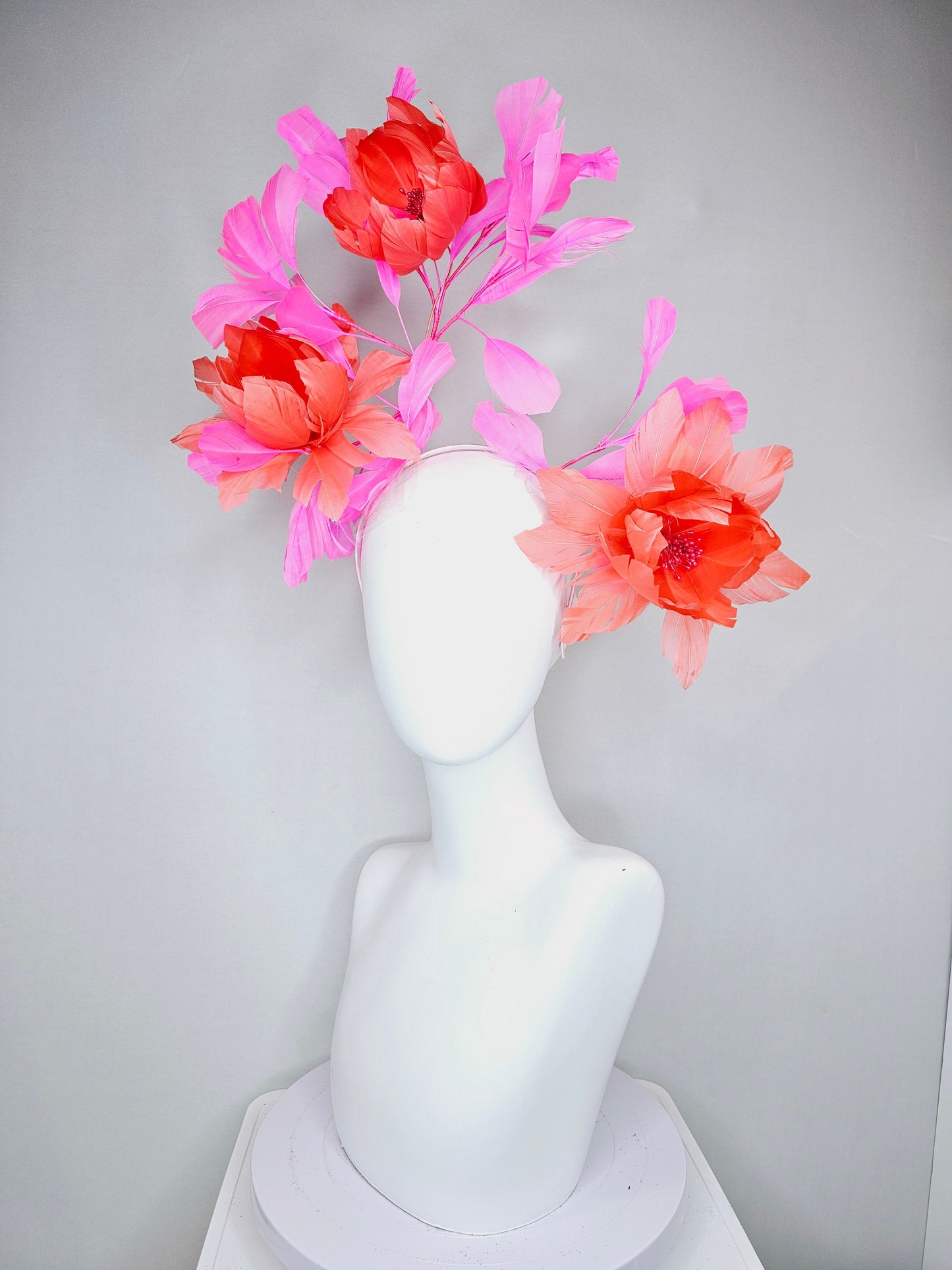 kentucky derby hat fascinator large fluffy coral orange feather flowers with pink feathers