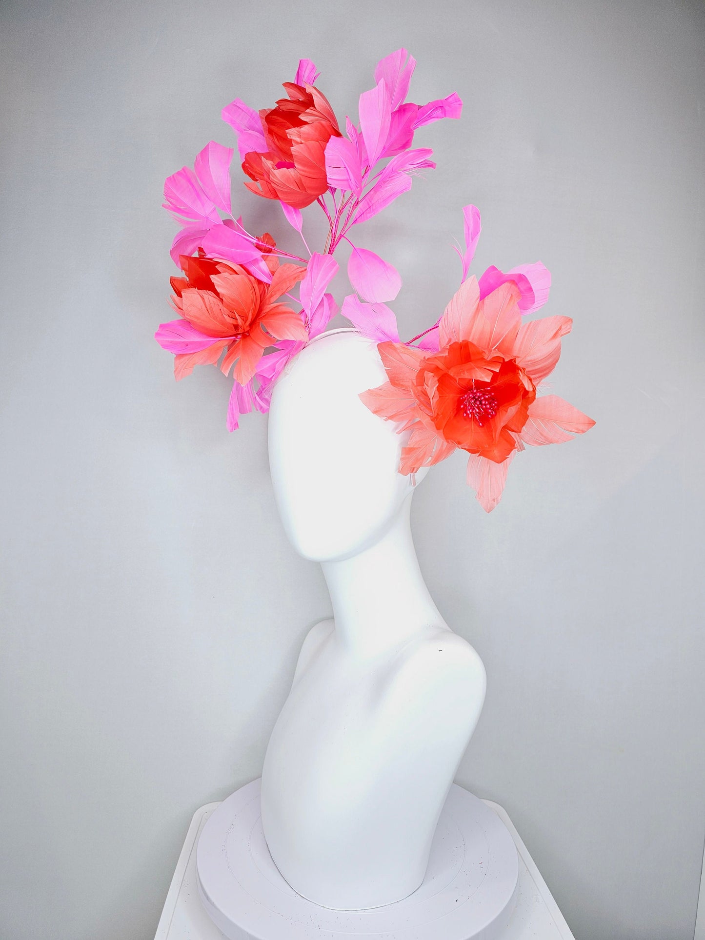 kentucky derby hat fascinator large fluffy coral orange feather flowers with pink feathers